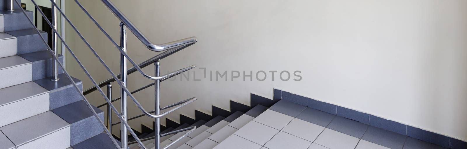 The interior staircase between floors in high-rise building by bonilook