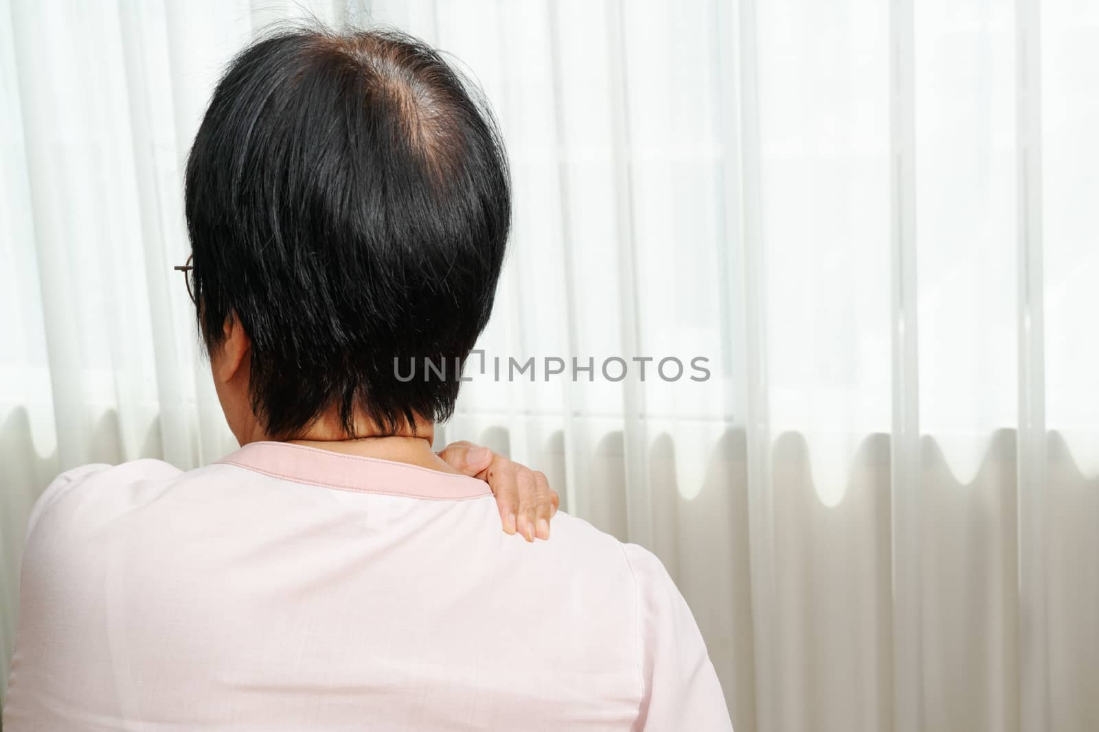 neck and shoulder pain, old woman suffering from neck and shoulder injury, health problem concept