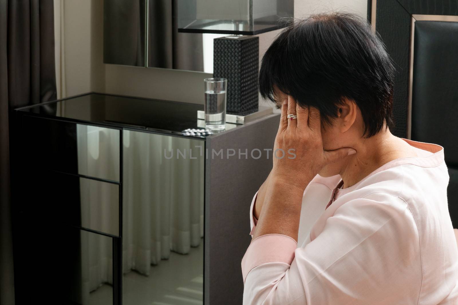 old woman suffering from headache, stress, migraine, health problem concept
