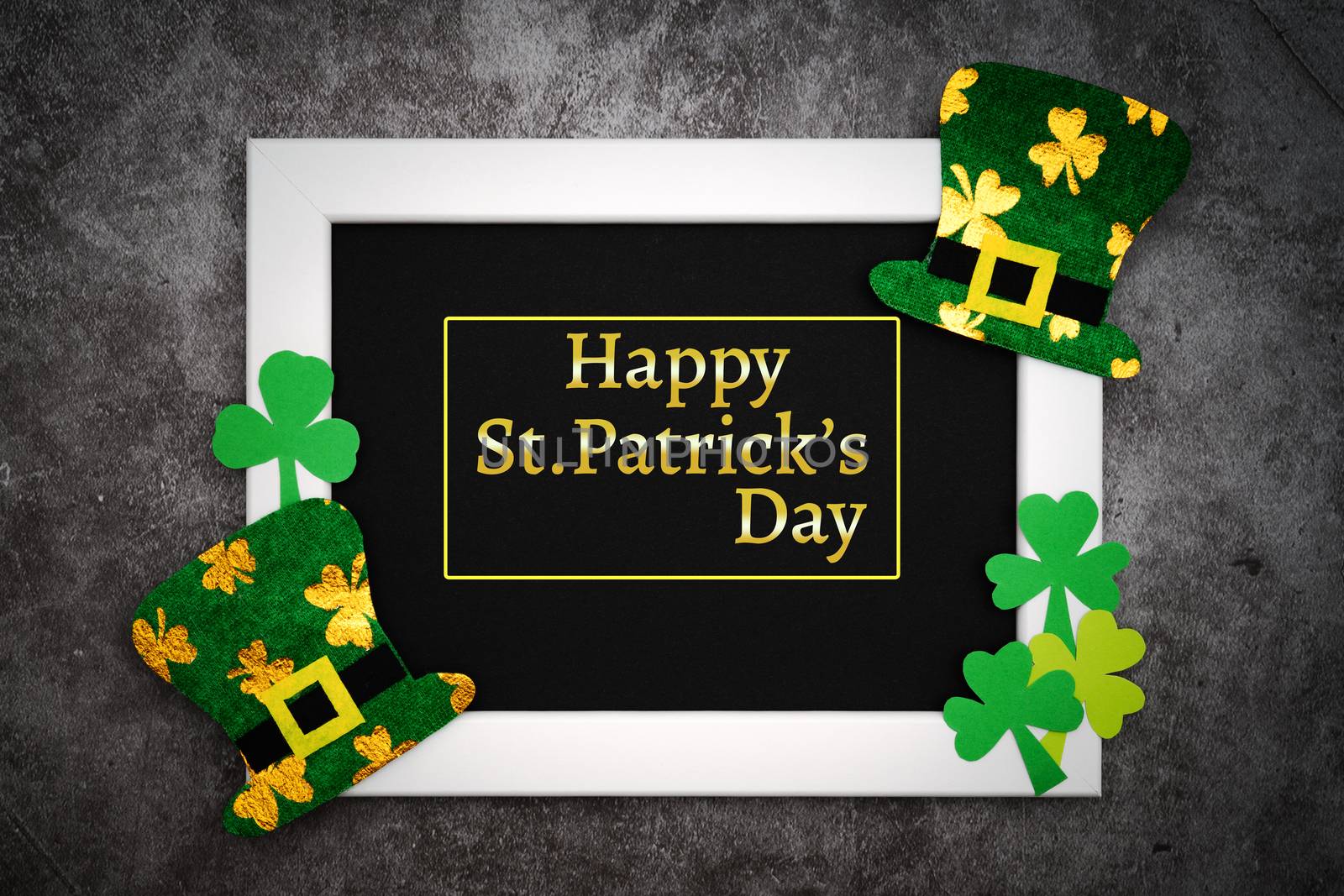 St Patricks day, festive leprechaun hat and green Shamrocks on photo frame