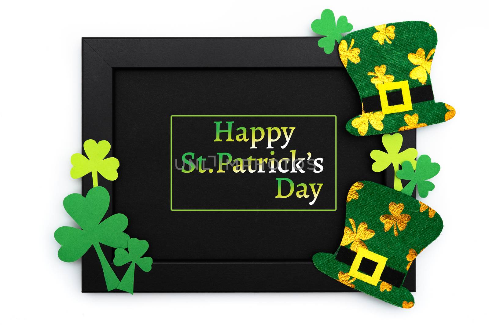 St Patricks day, festive leprechaun hat and green Shamrocks on photo frame