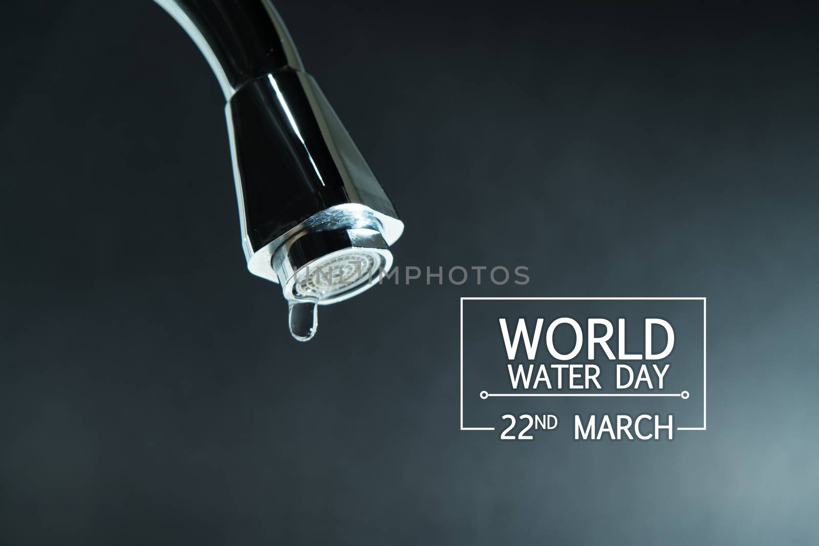 world water day, water drop on faucet with  black backgrounds