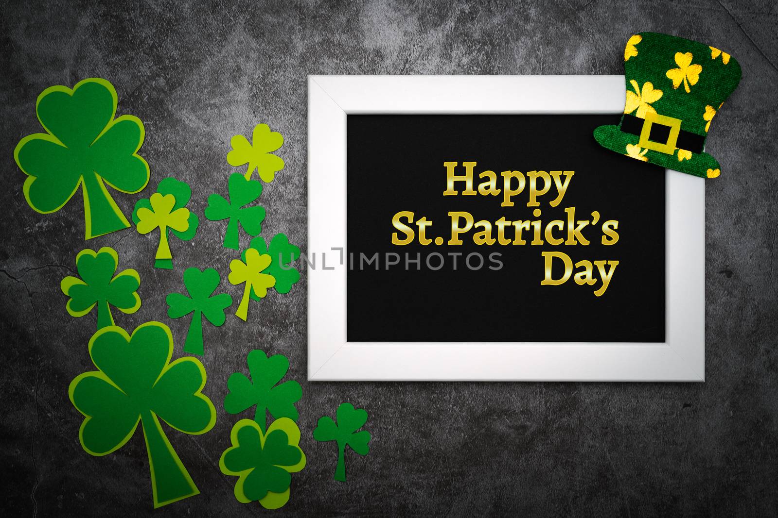 St Patricks day, festive leprechaun hat and green Shamrocks on photo frame