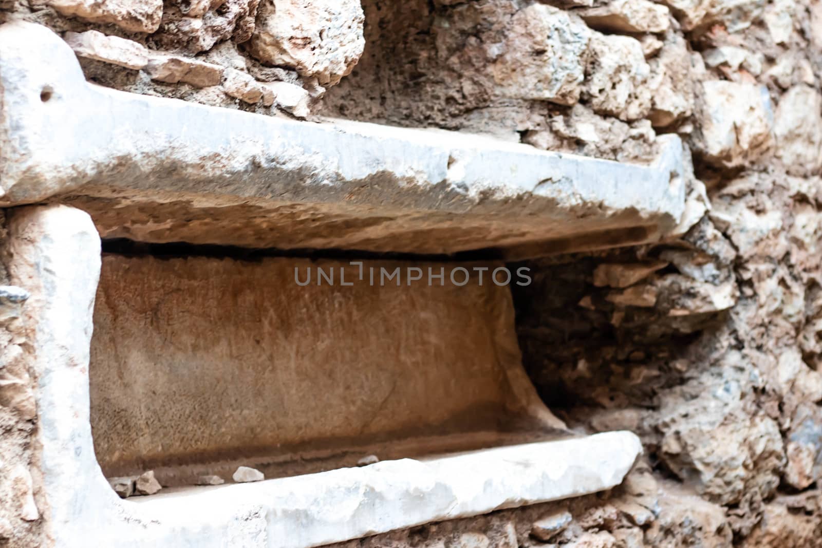 side view of interesting antique stone storage or furnace. photo has taken at ancient city efes.
