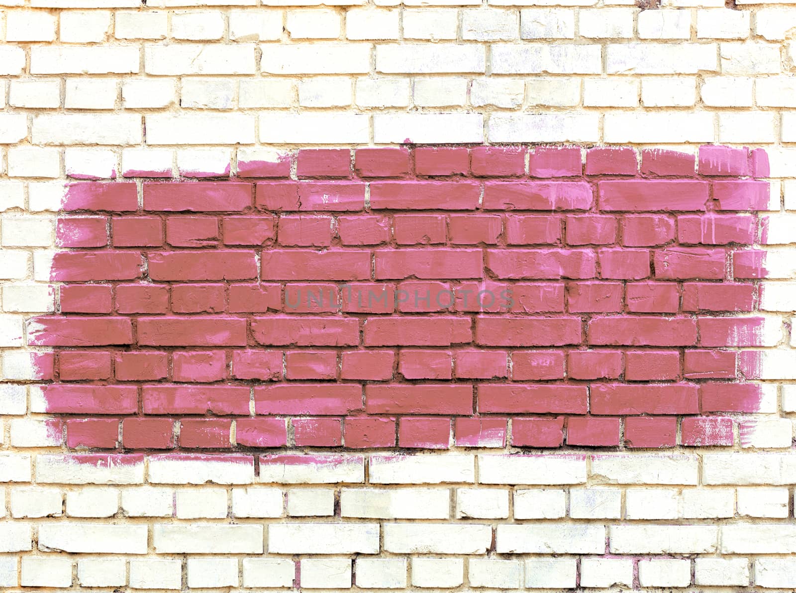 On the white old brick wall the selected fragment is painted with broun paint. by Sergii