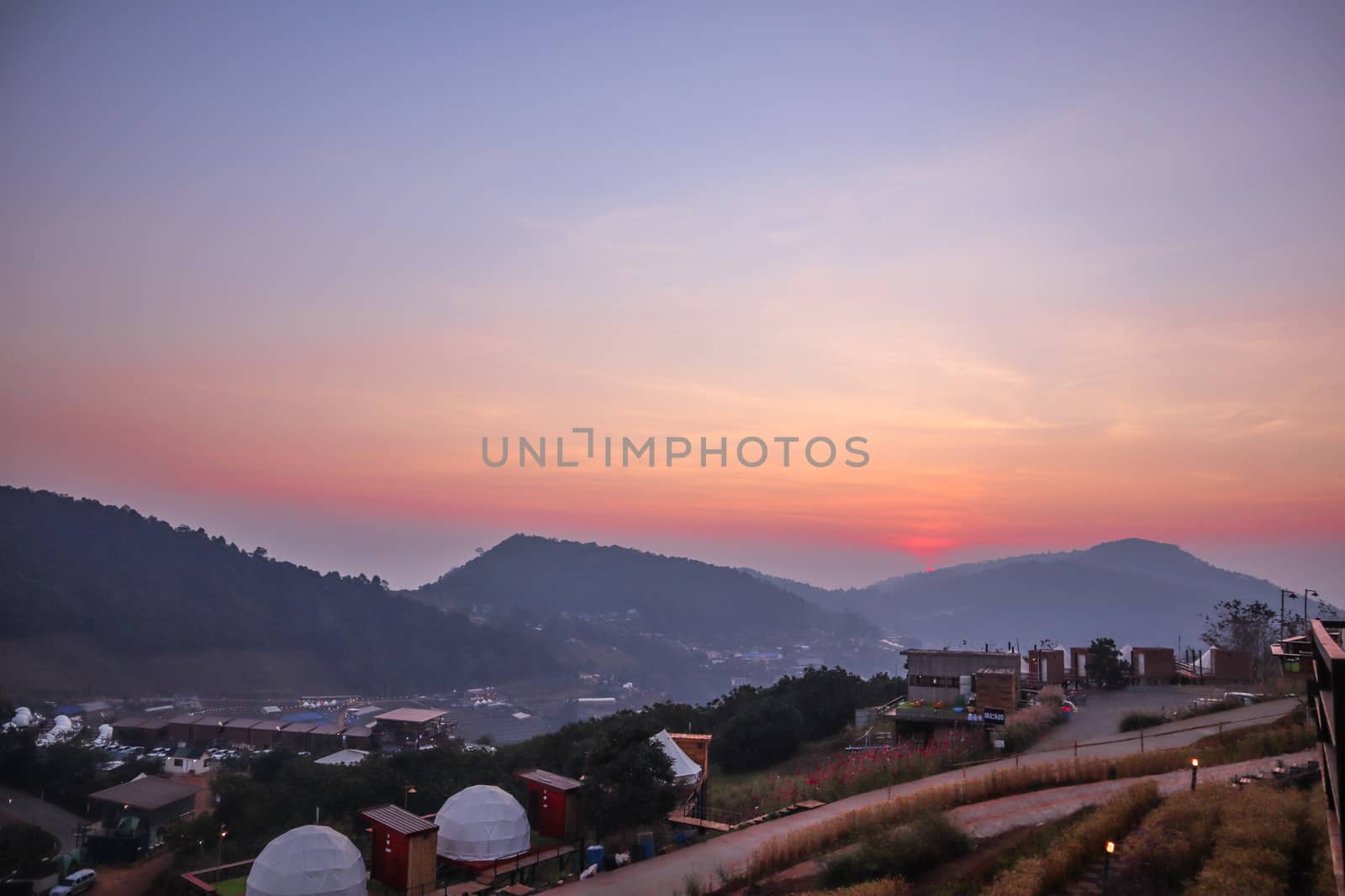 The mountain sunset in a thai village near mountains in Chiang Mai, Thailand. The mountain scenery view