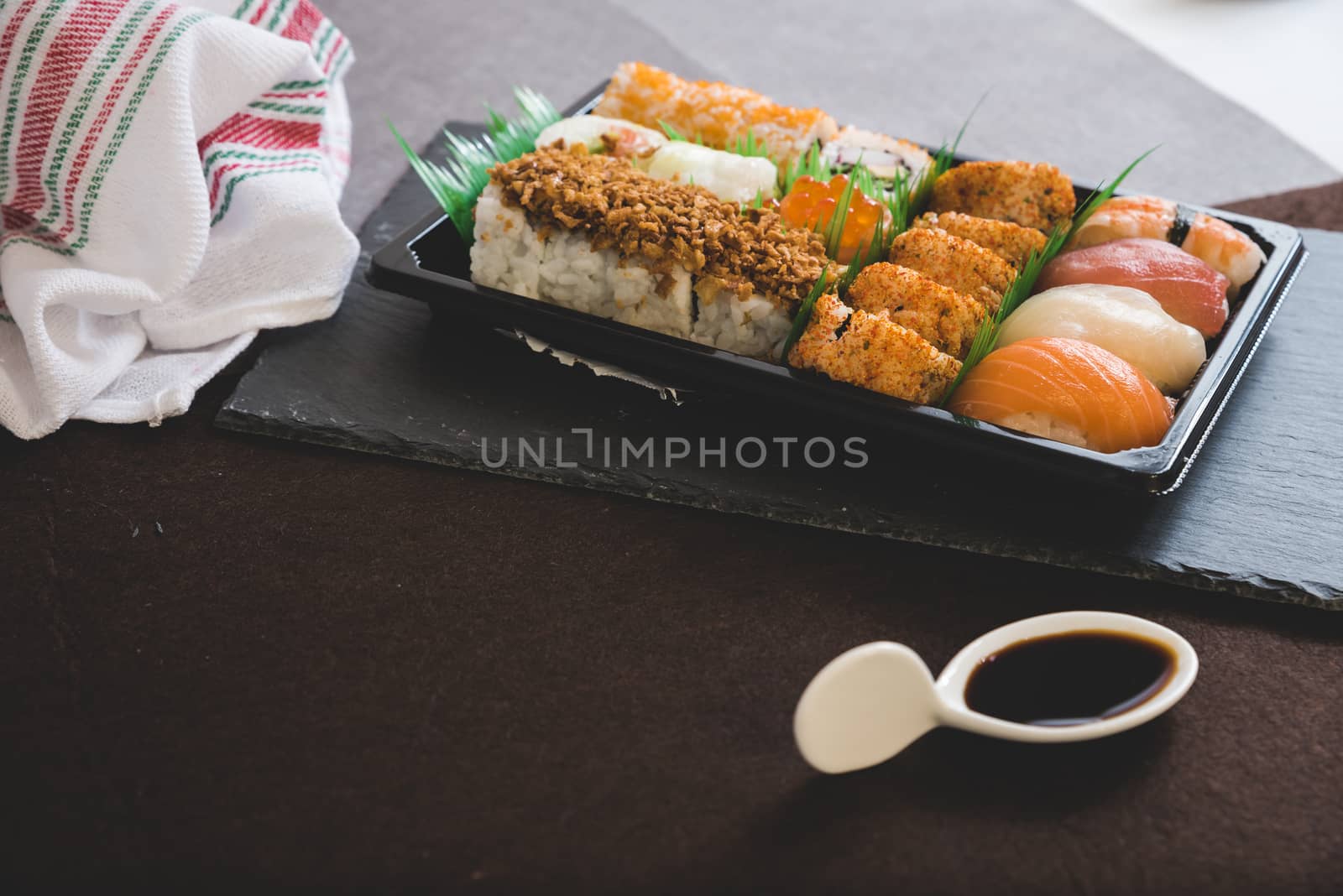 Raw fresh Salmon sushi roll maki - japanese food.