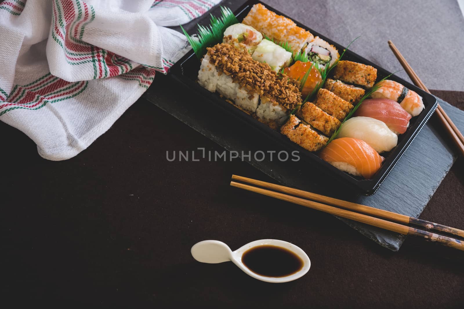 Raw fresh Salmon sushi roll maki - japanese food.