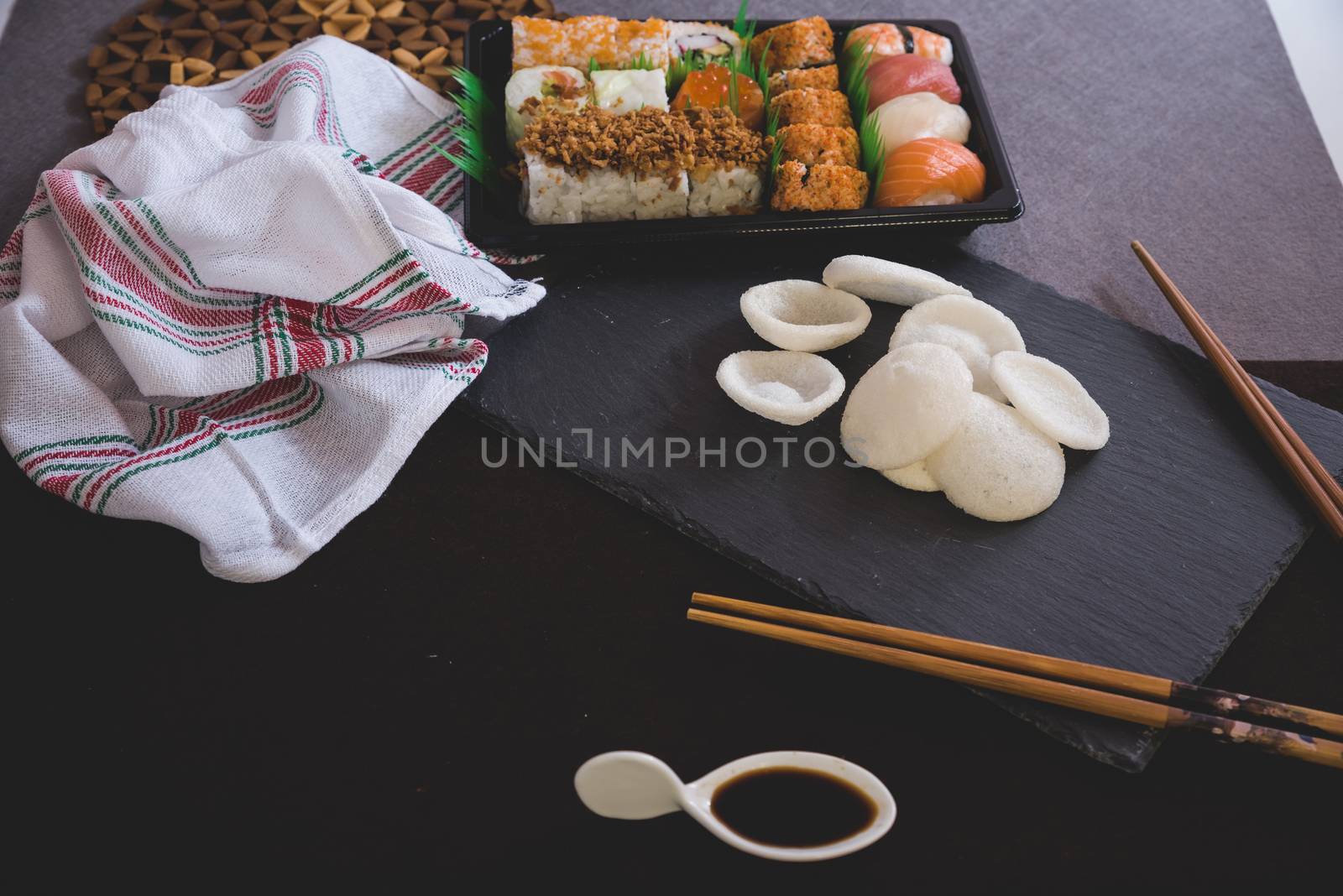 Raw fresh Salmon sushi roll maki - japanese food.