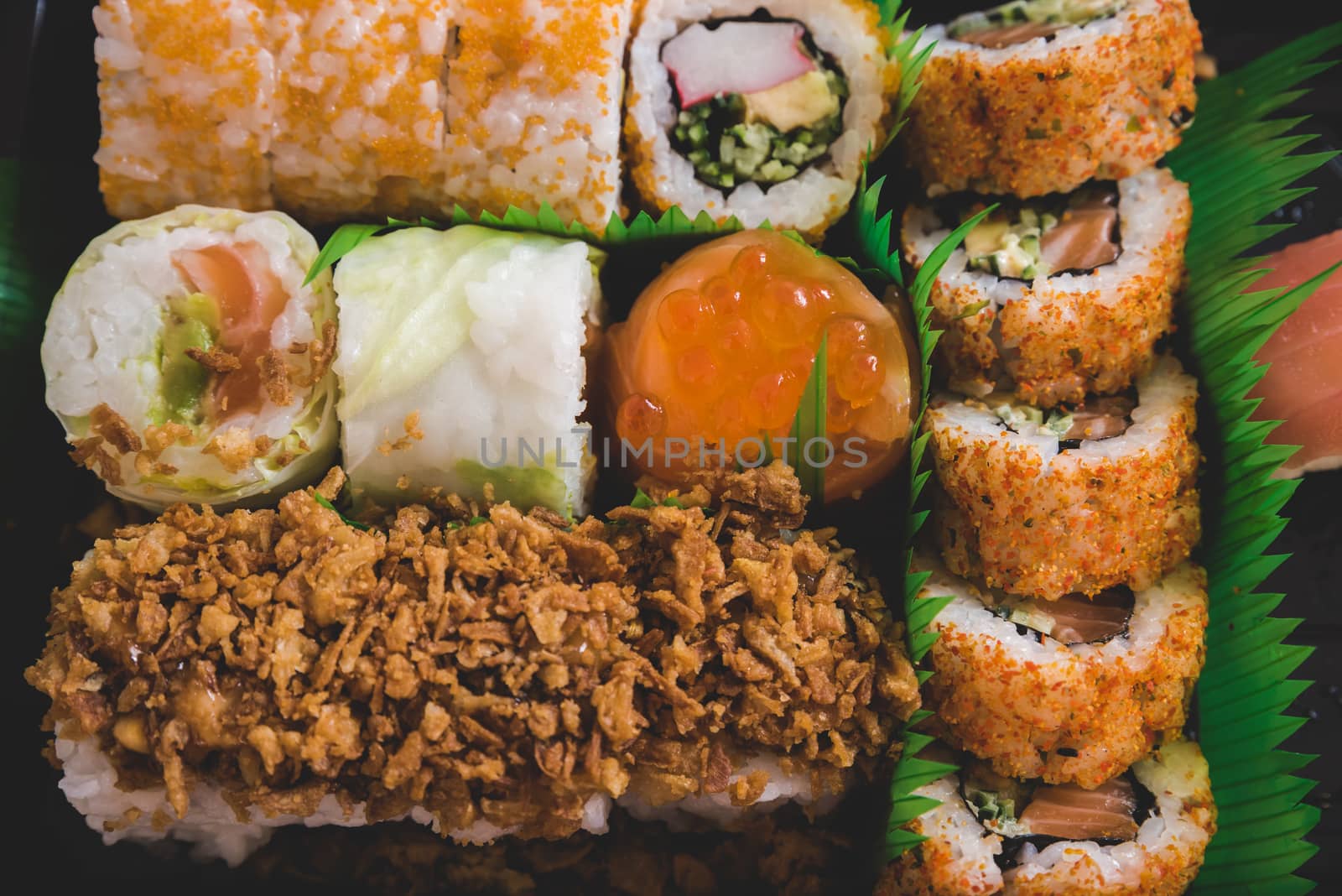 Raw fresh Salmon sushi roll maki - japanese food.