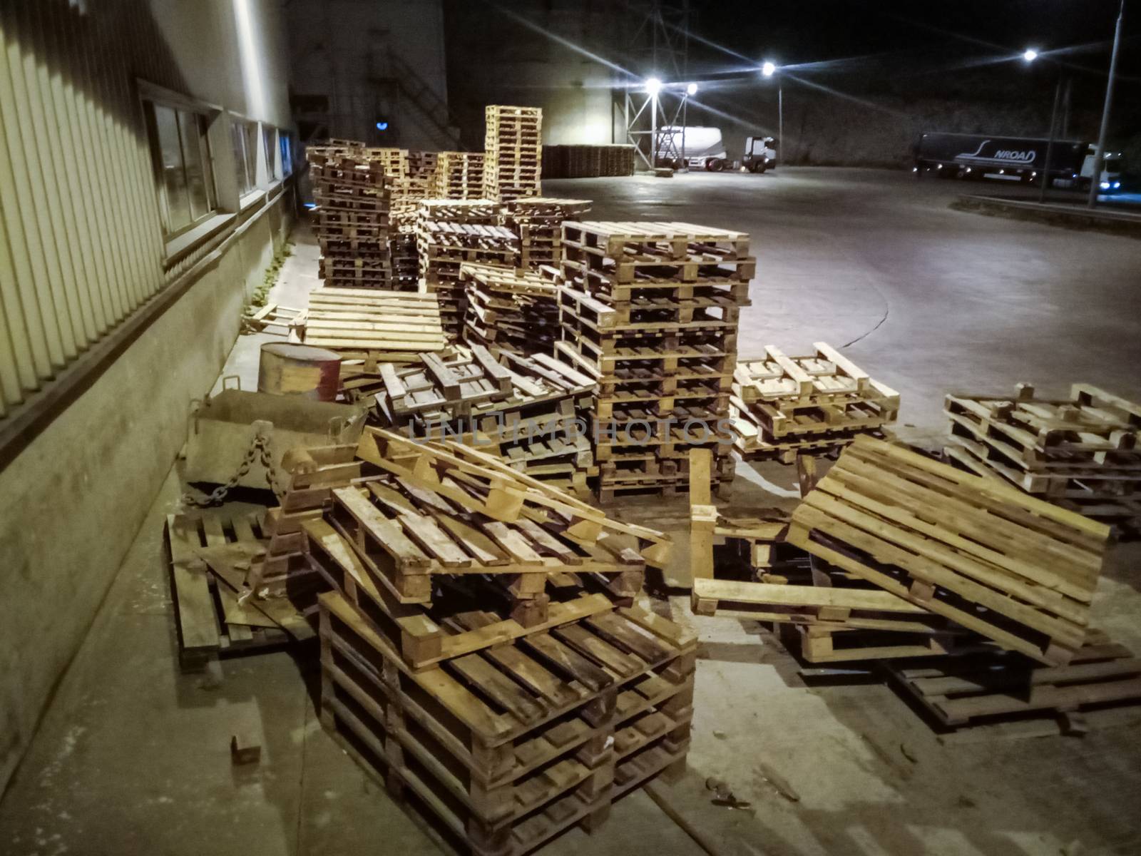 Pallet racks inside a cement plant. Loading shop of a cement plant.