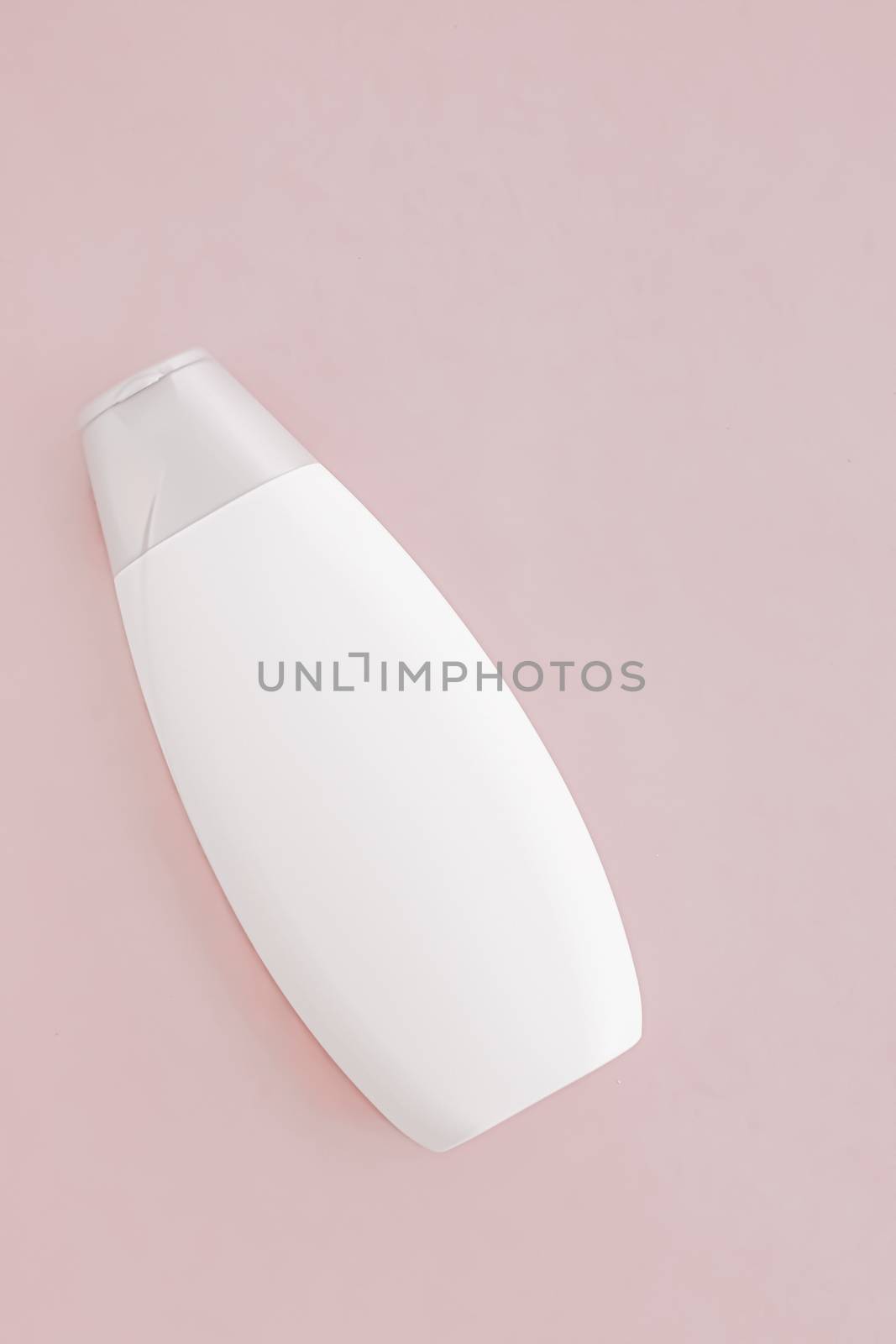 Blank label shampoo bottle or shower gel on pink background, beauty product and body care cosmetics by Anneleven