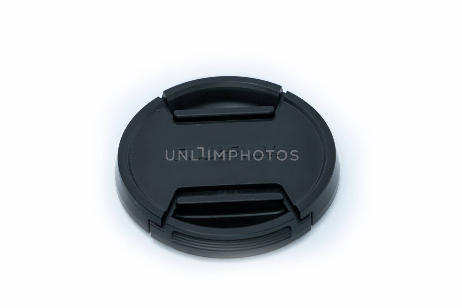Chonburi, Thailand - MAY 20, 2020: Lens caps For Fujifilm lens on the withe background with space for put the text.