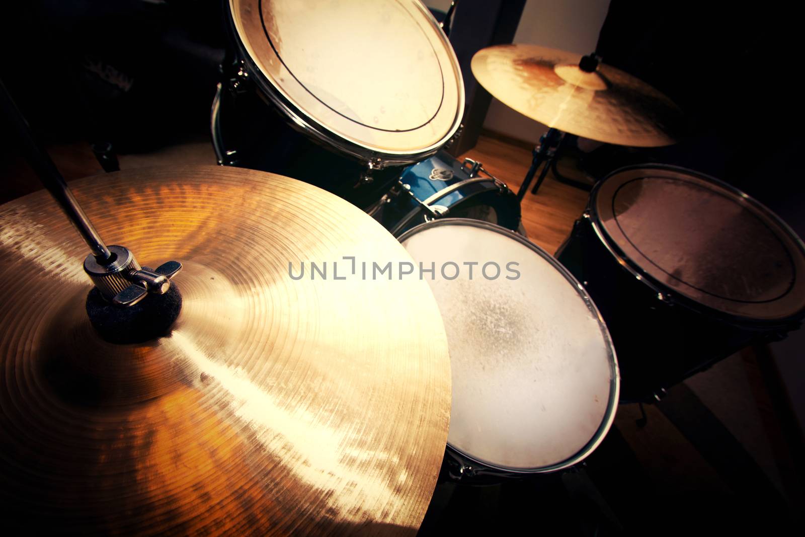 Drums conceptual image. Picture of drums and drumsticks lying on snare drum.