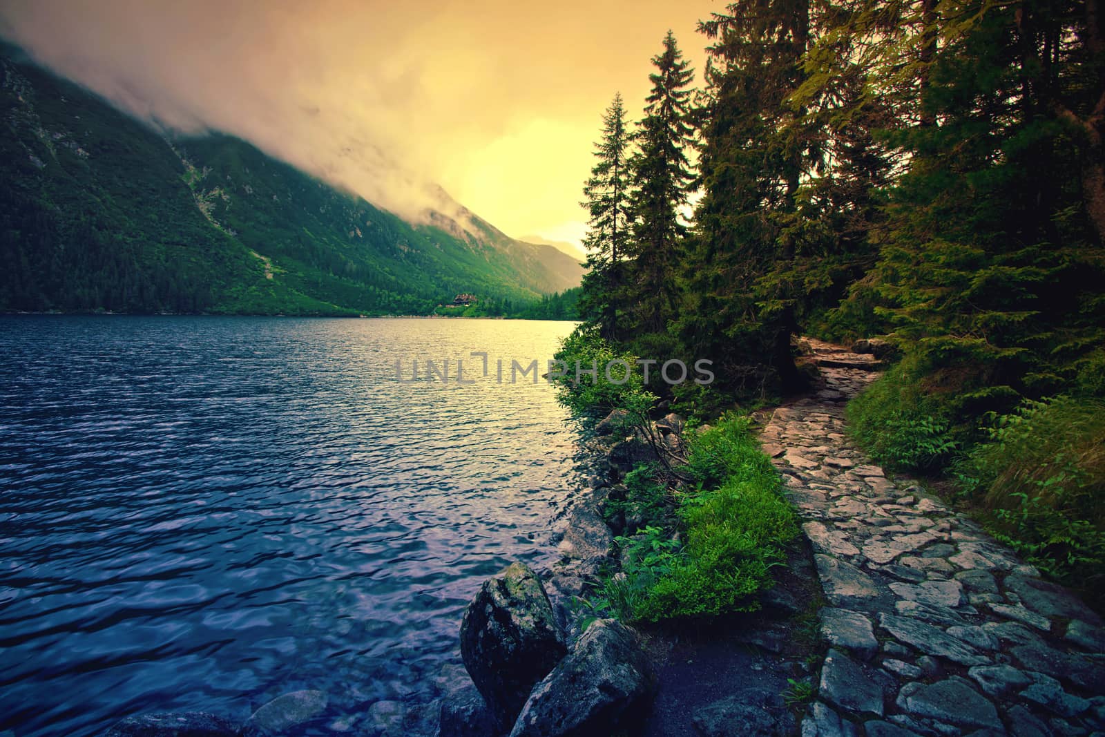 Lake in mountains. Fantasy and colorfull nature landscape. Morskie Oko lake.