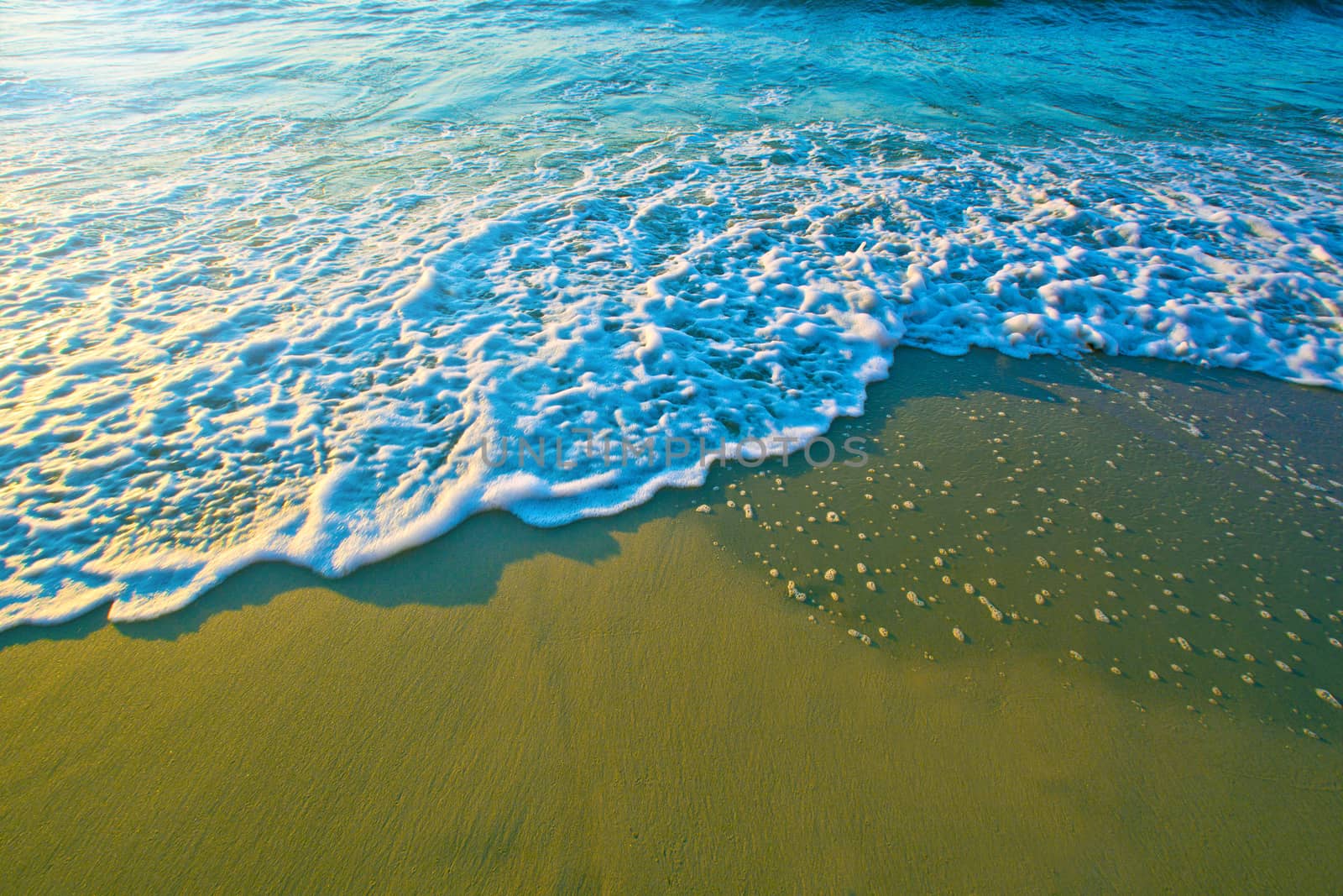 Blue sea waves on sand. by satariel