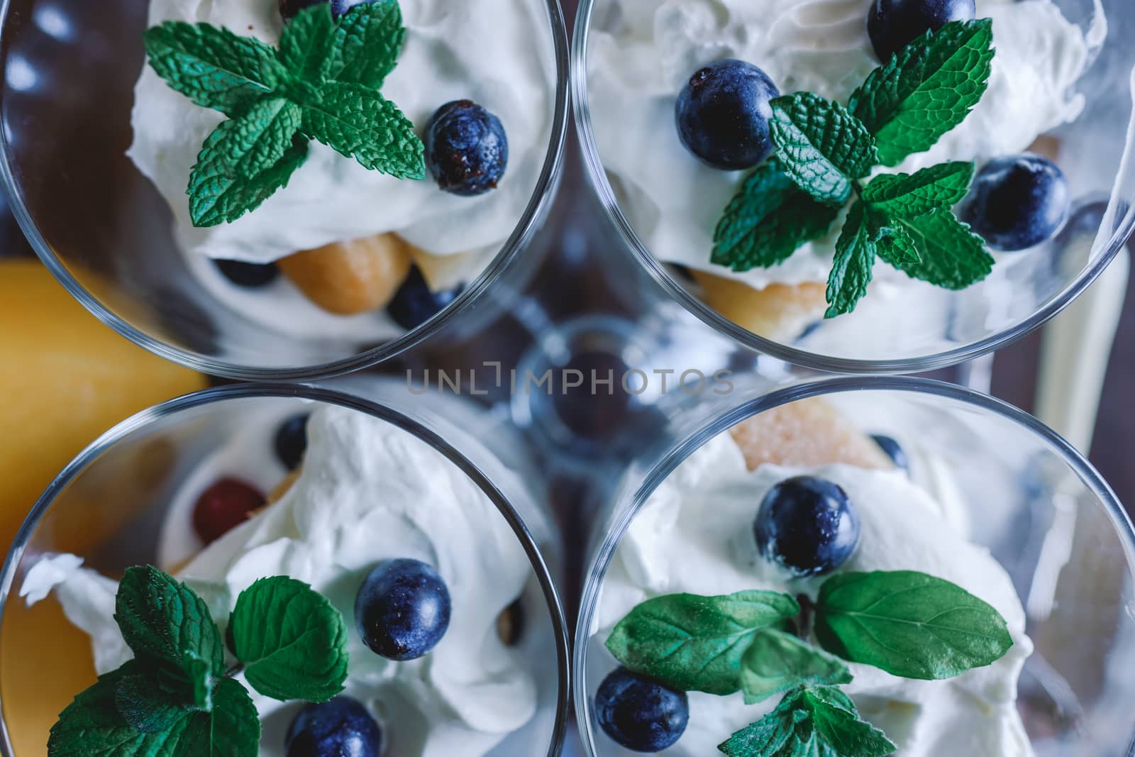 Top view of delicious dessert in glass cups.