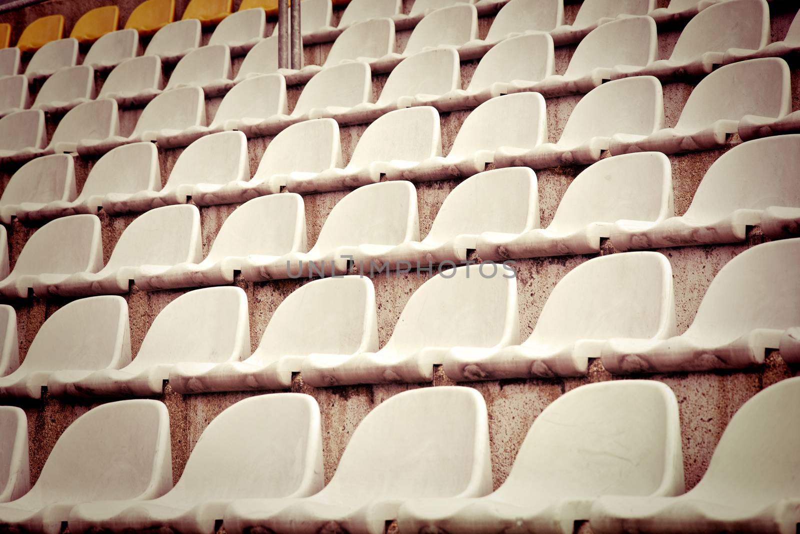 Seats in the stadium stands. Football and sport concept.