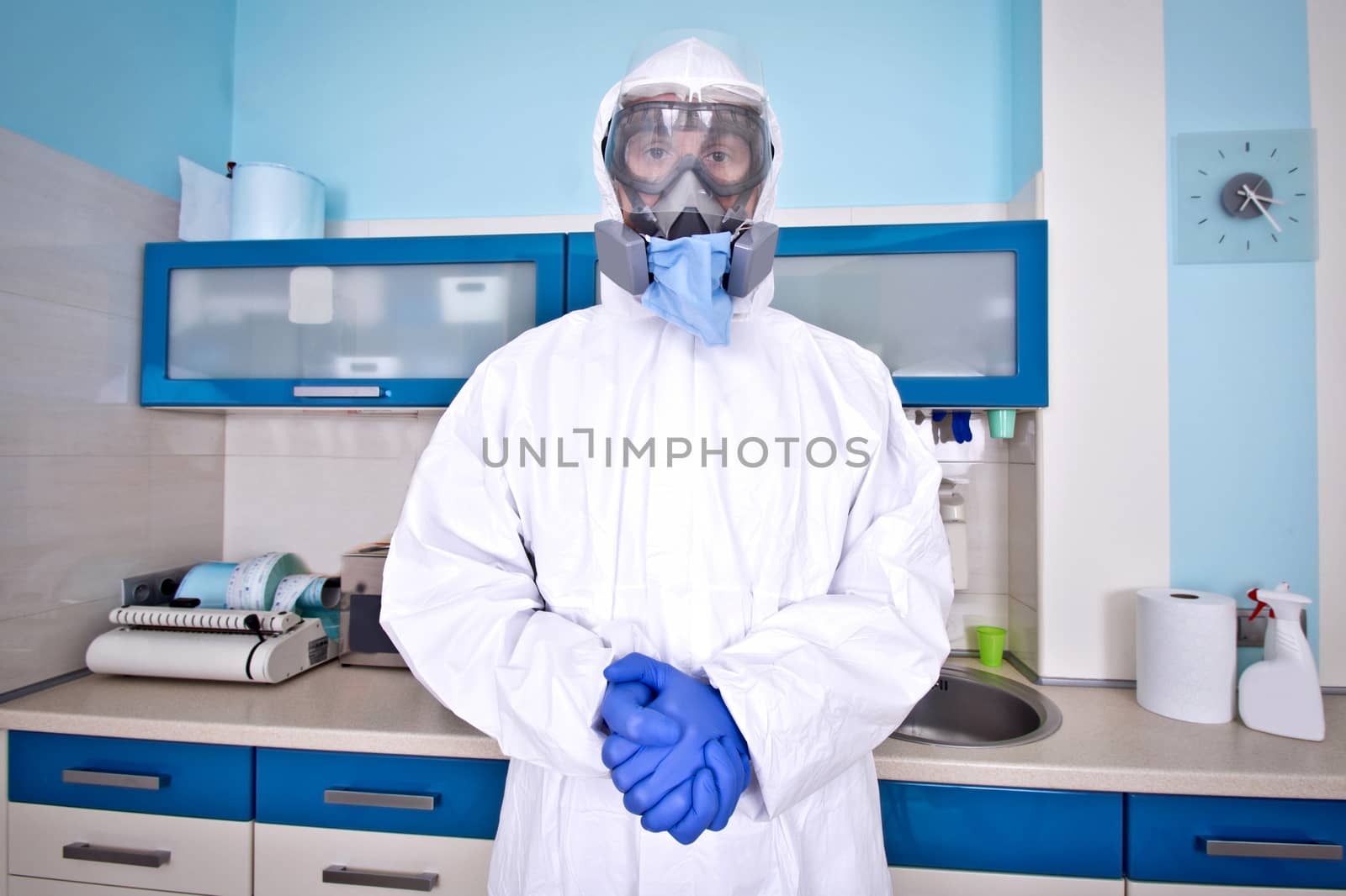 Doctor in protective suit uniform and mask. by satariel