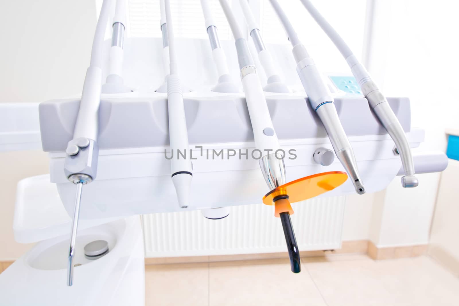 Professional Dentist tools in the dental office. Dental Hygiene and Health conceptual image.