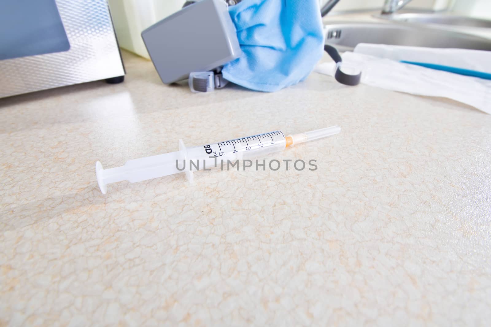 Syringe at the doctor office. Health care concept.