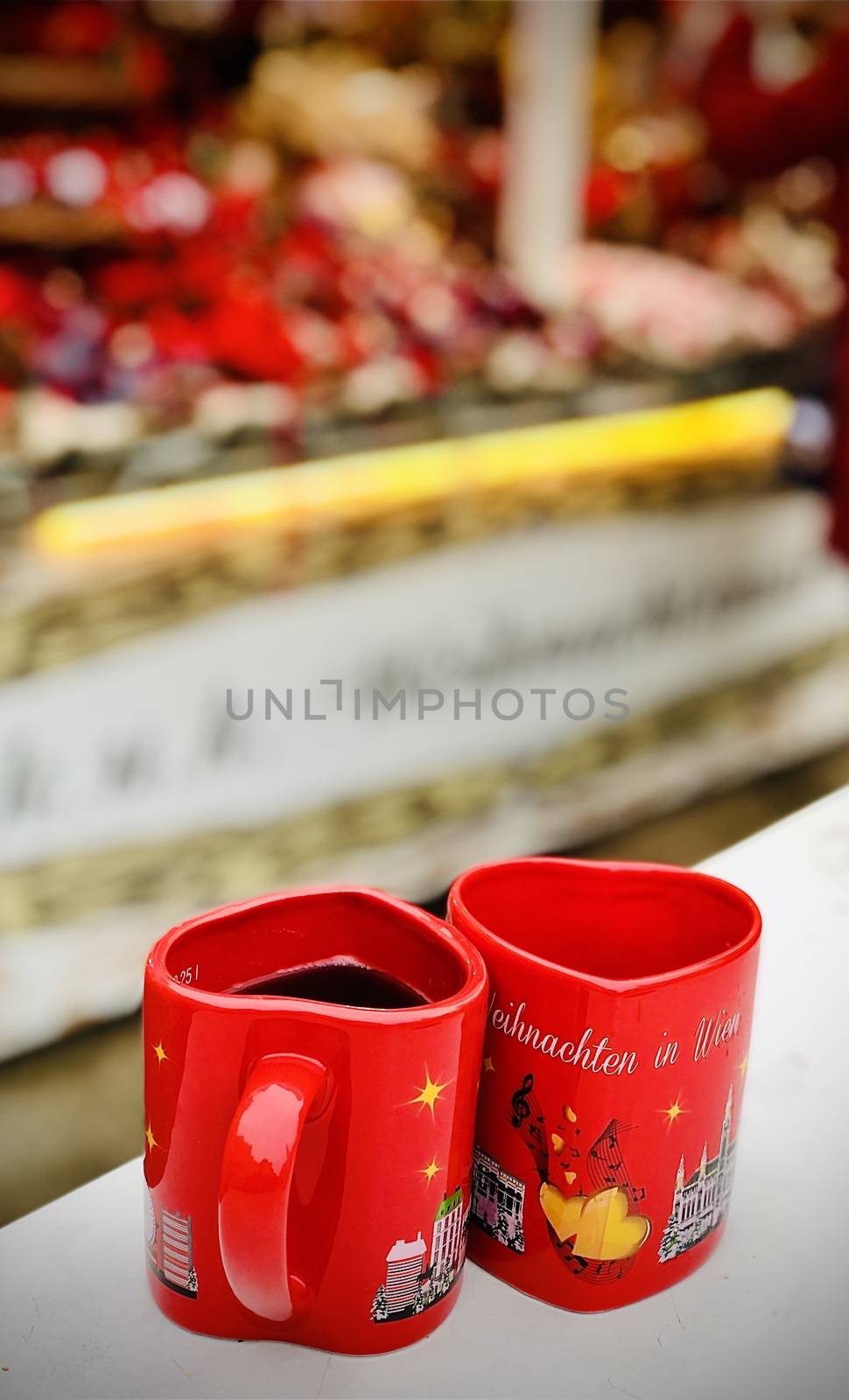 Hot gluwein in red heart shped mugs in Vienna, Austria. Shot taken at  16 December 2019 at the Christmass markets 