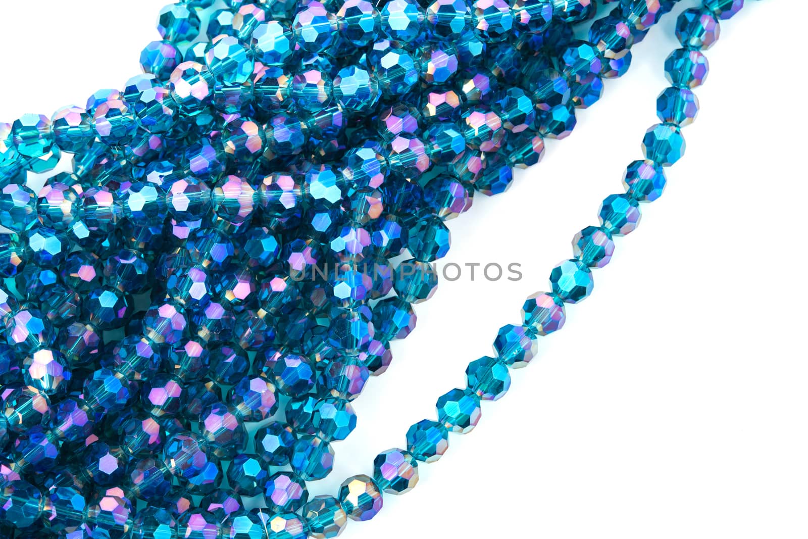 Beautiful Light Blue Glass Sparkle Crystal Isoalted Beads on white background. Use for diy beaded jewelry