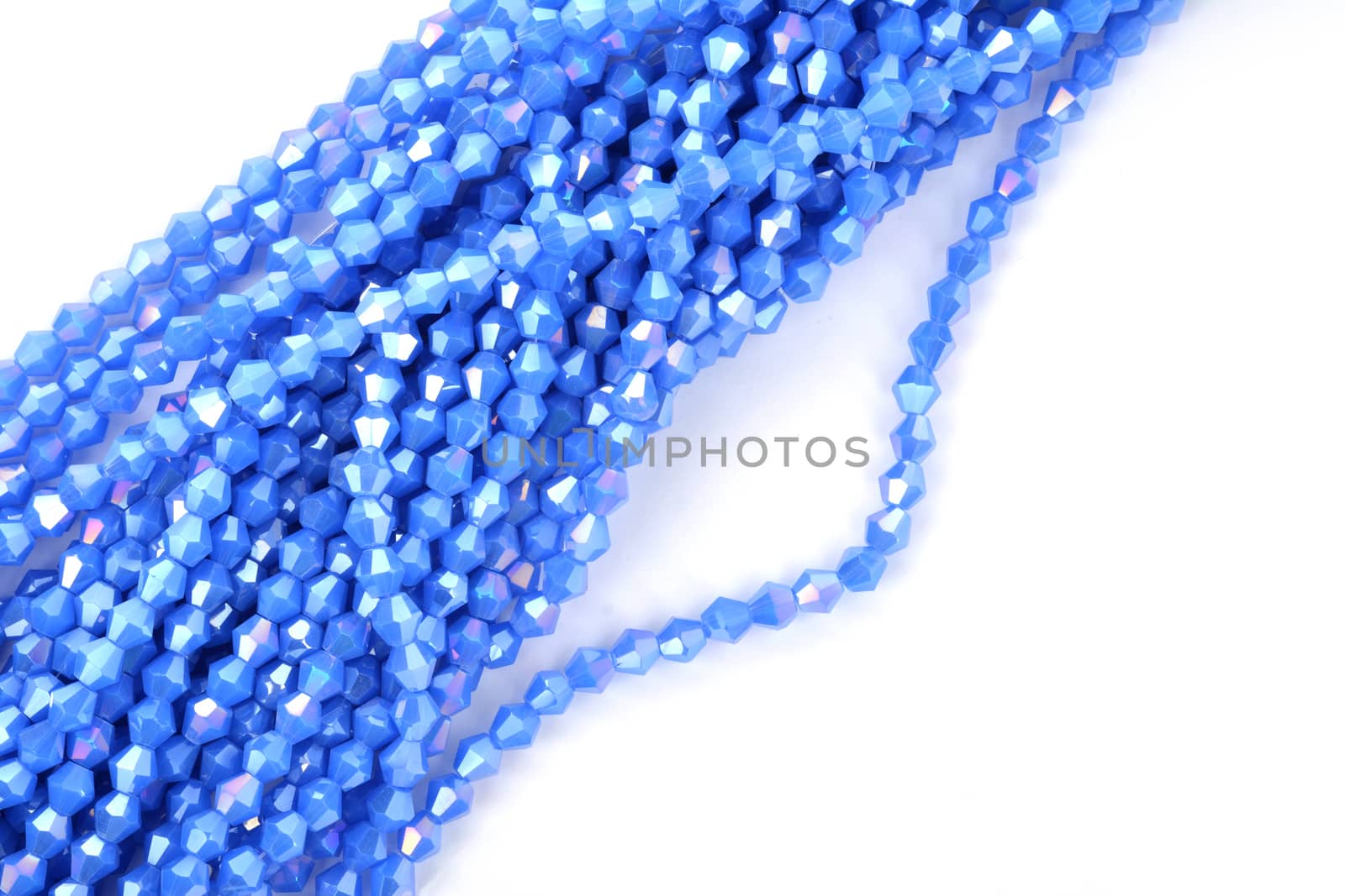 Beautiful Light Blue Glass Sparkle Crystal Isoalted Beads on white background. Use for diy beaded jewelry