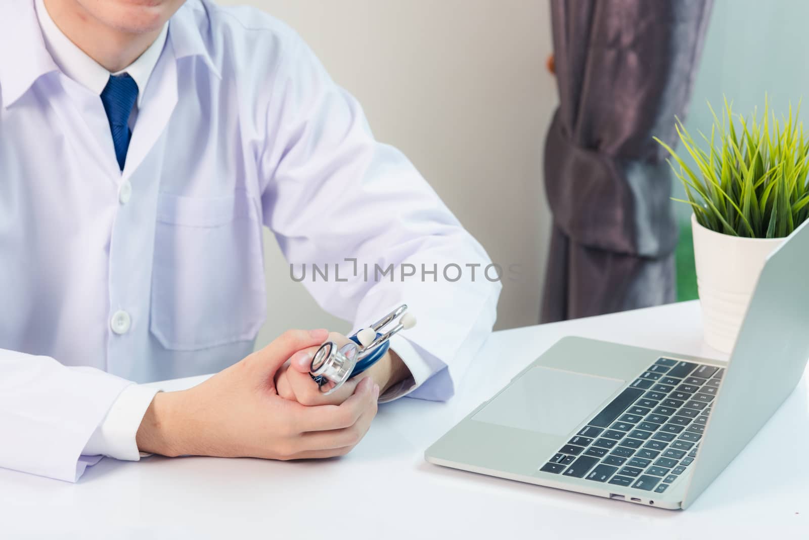 Medicine doctor's working on desk. Closeup of Stethoscope by Sorapop