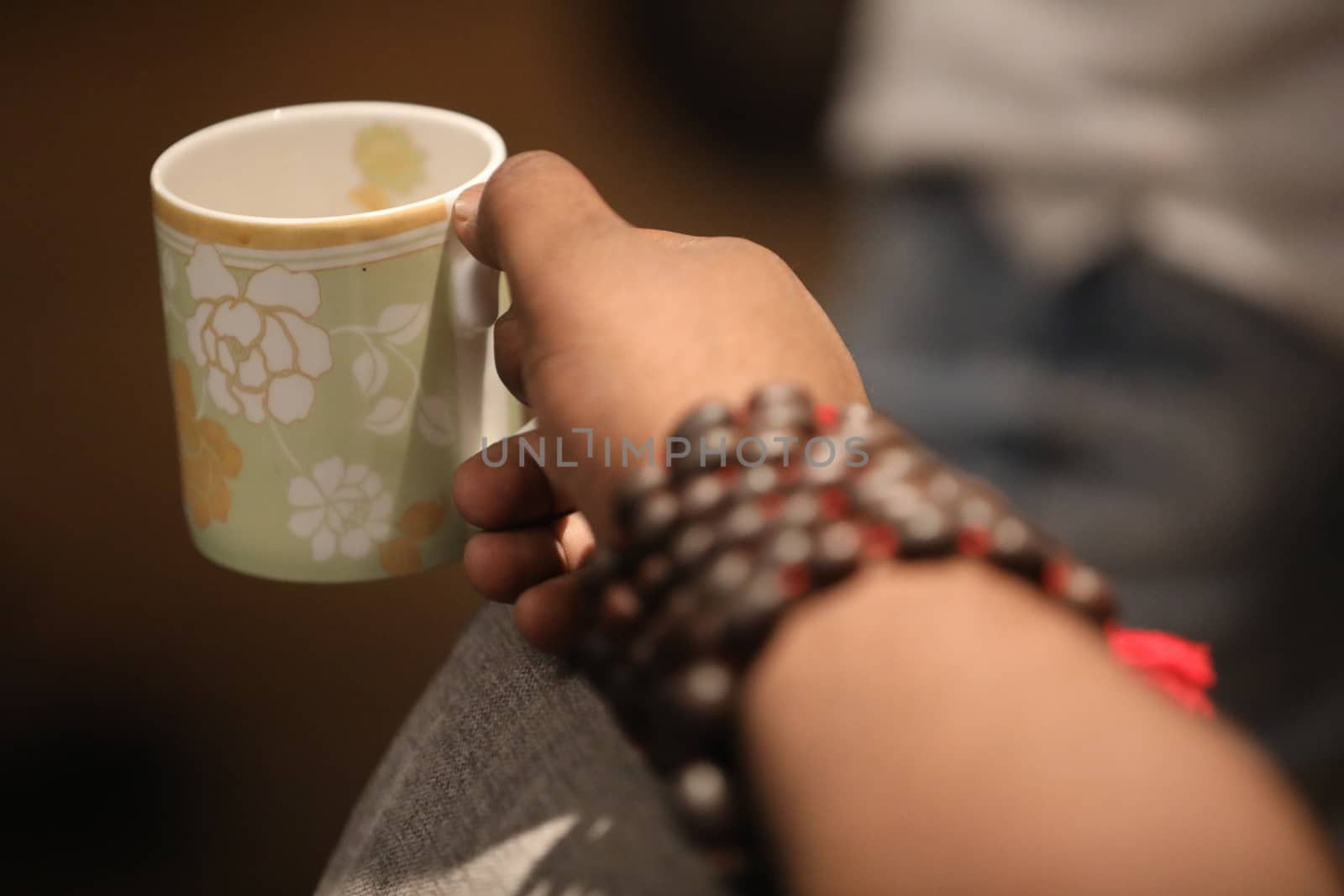 Male hand with cup