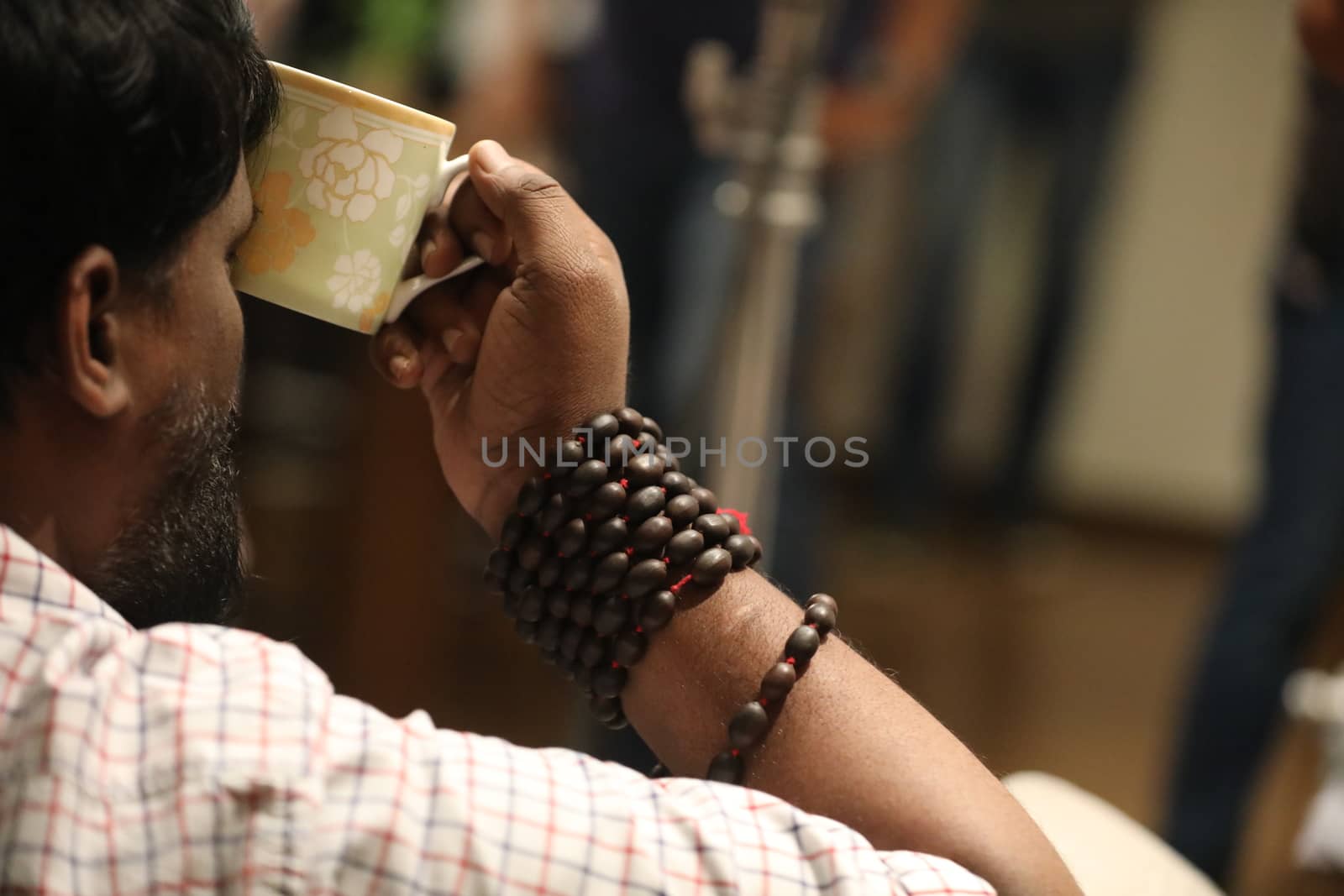 Male hand with cup