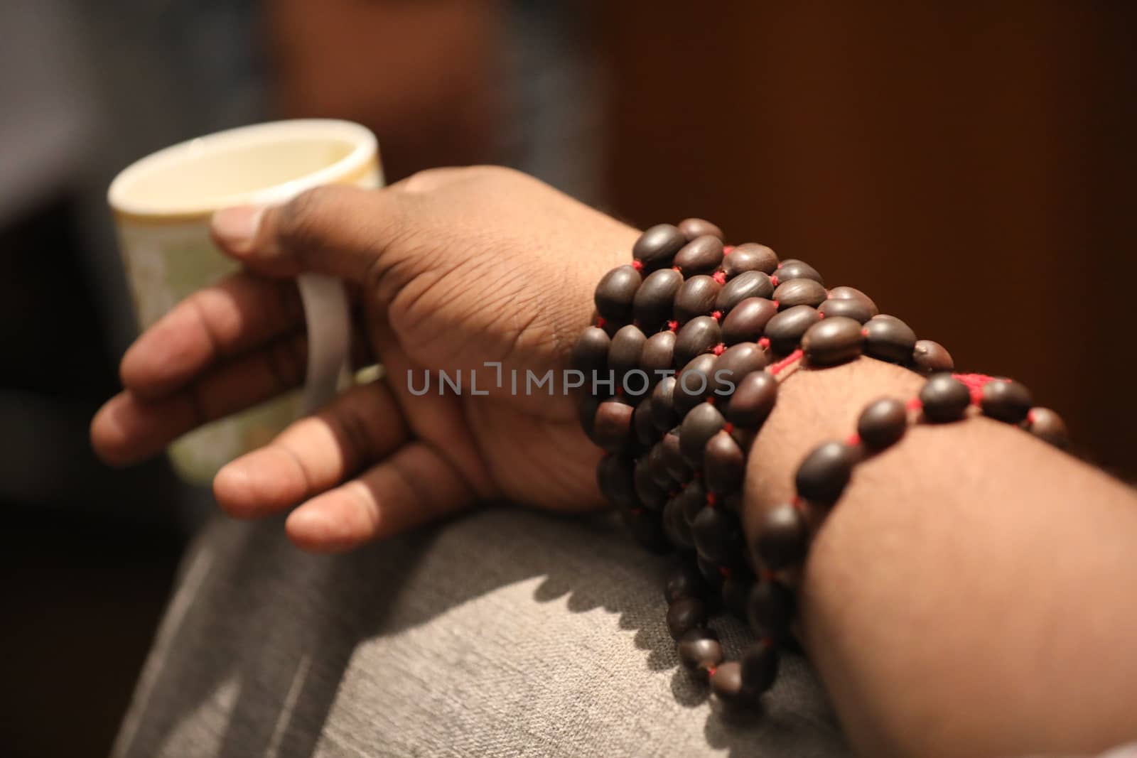 Male hand with cup