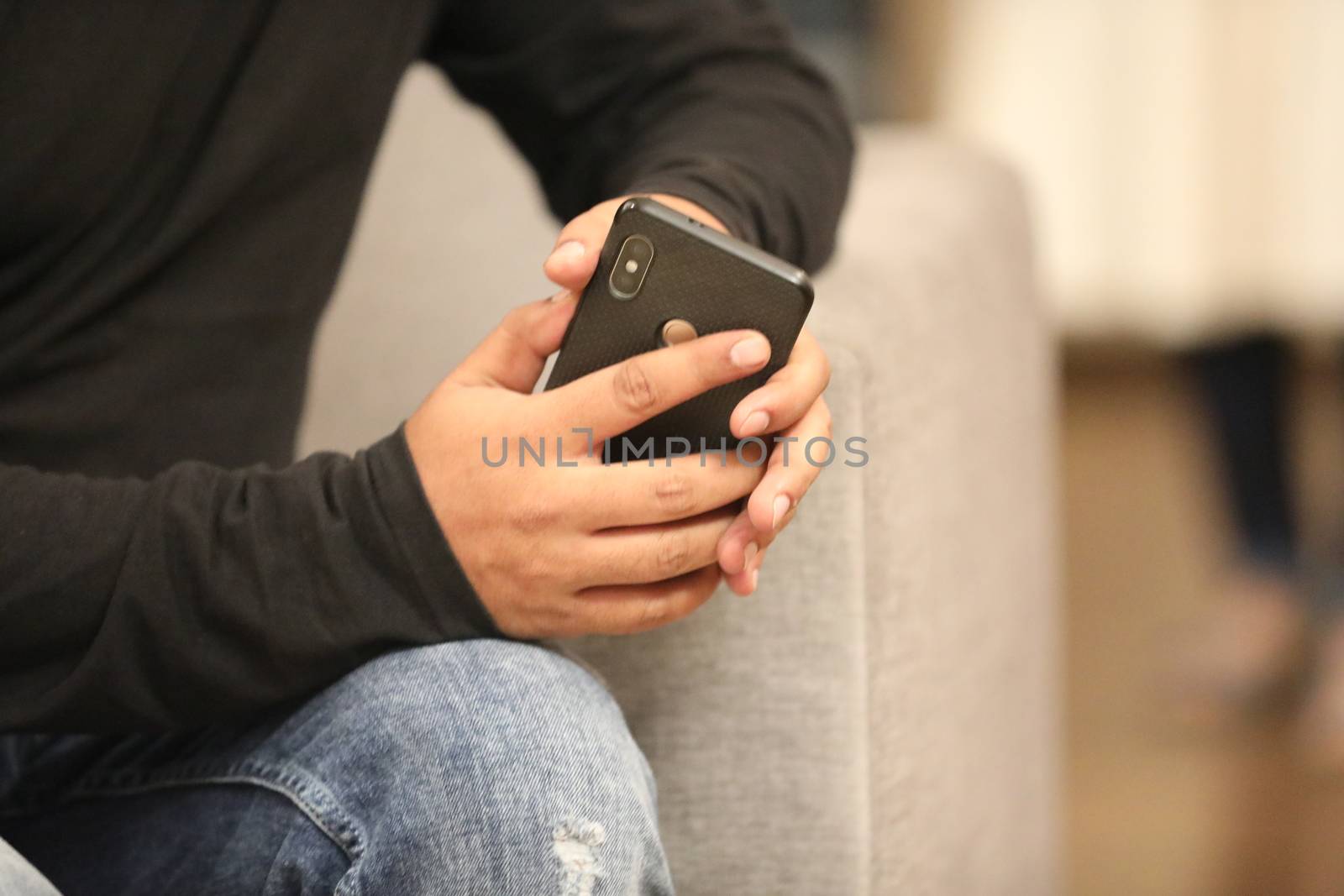 Male Model hands with cell phone