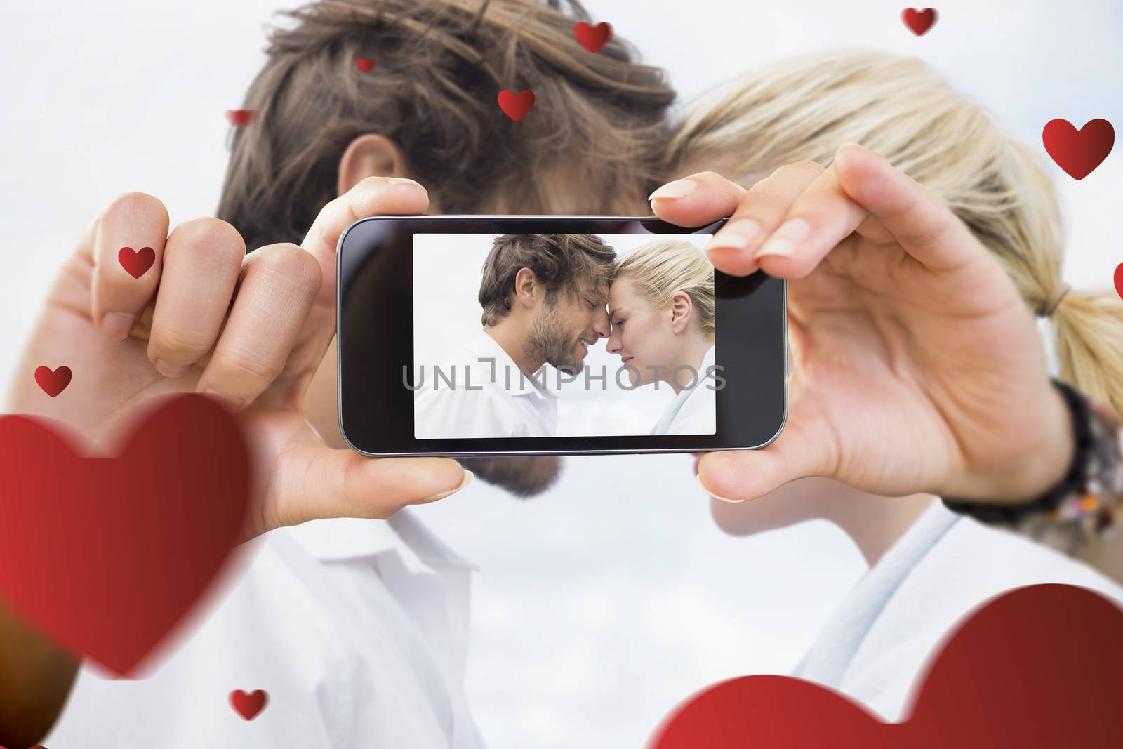 Composite image of valentines couple by Wavebreakmedia