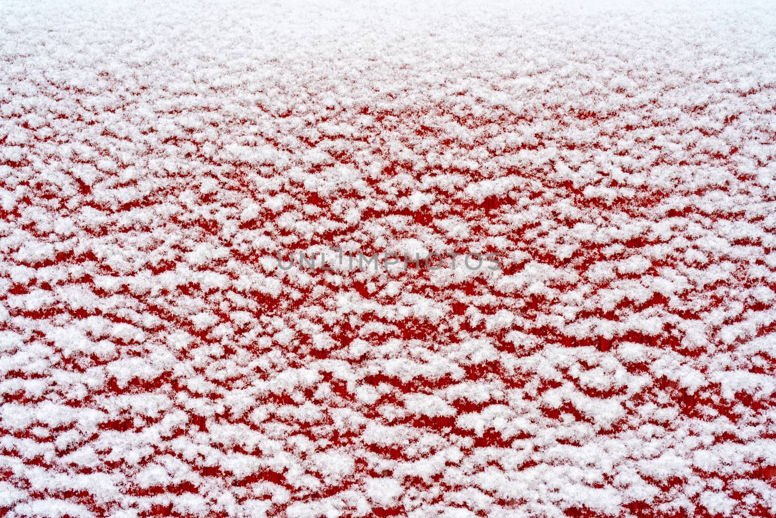 The surface of the white snow. The texture of the snow. Winter background.