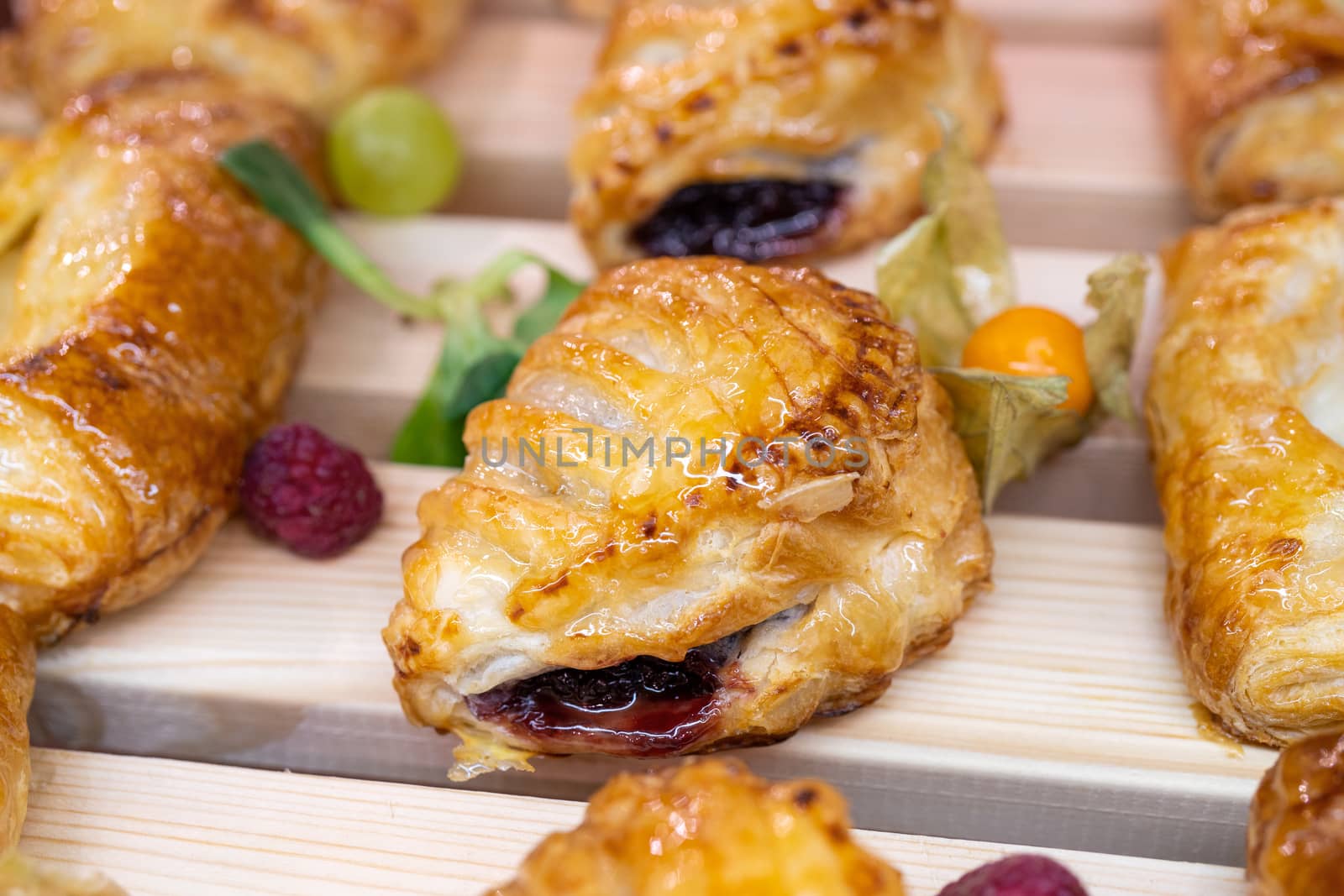 Cake with raspberry jam. Sweet treat for the holiday. Delicious fresh pastries.