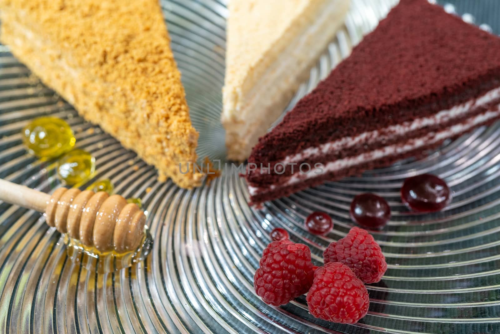 Cake with raspberry jam and honey. Sweet treat for the holiday. Delicious fresh pastries.