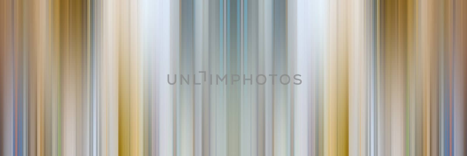 Abstract vertical lines background. Streaks are blurry in motion.