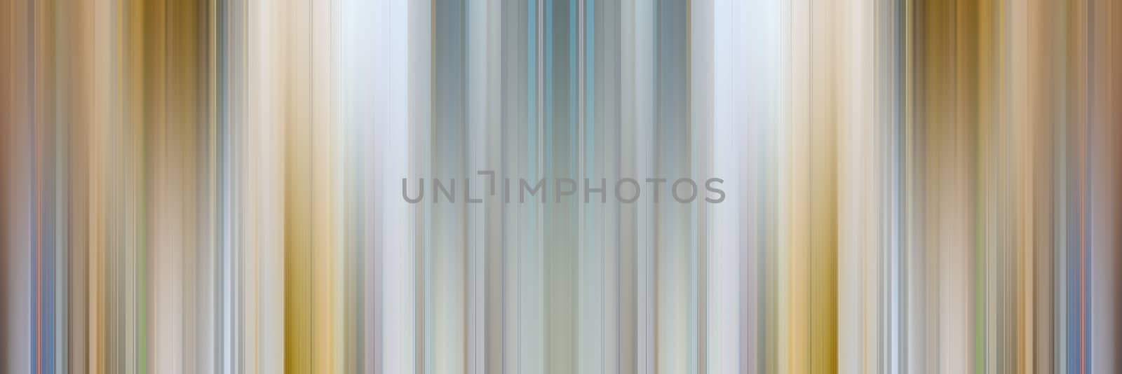 Abstract vertical lines background. Streaks are blurry in motion.