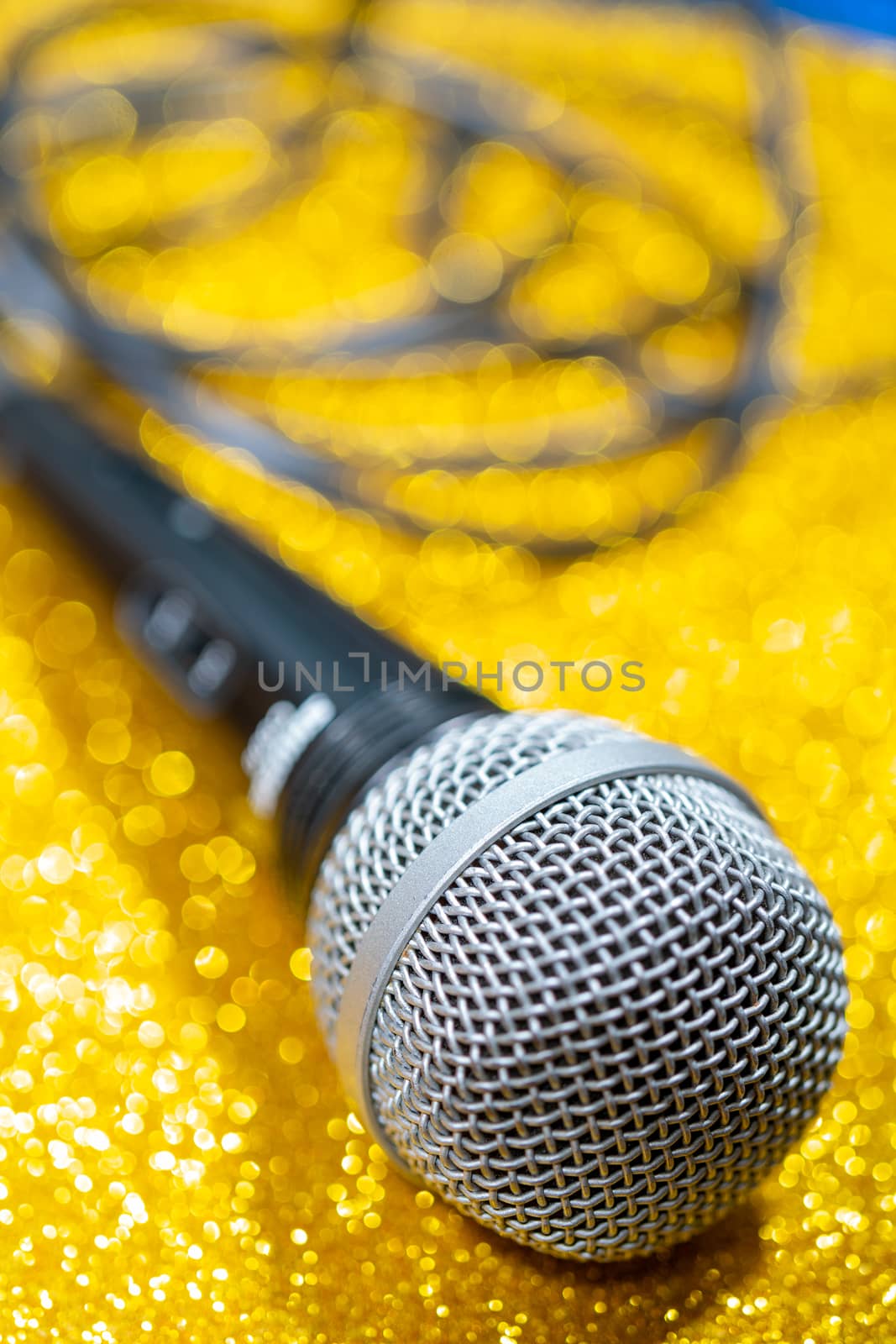 Professional dynamic microphone. Concert microphone for voice recording and sound enhancement. Sound equipment.