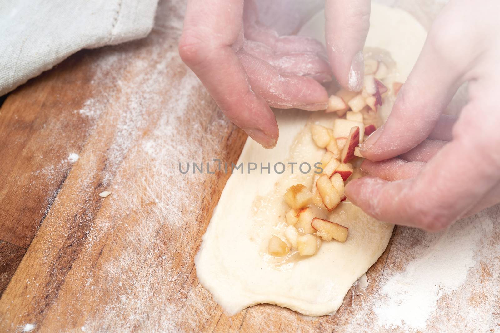 Apple pie. Dough products. Bake dessert in the kitchen at home. Homemade food recipe.