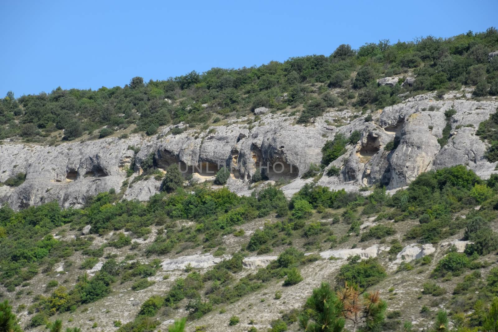 Ancient quarries in rocks. Evidence of an ancient highly developed civilization. Crimean peninsula. by fedoseevaolga