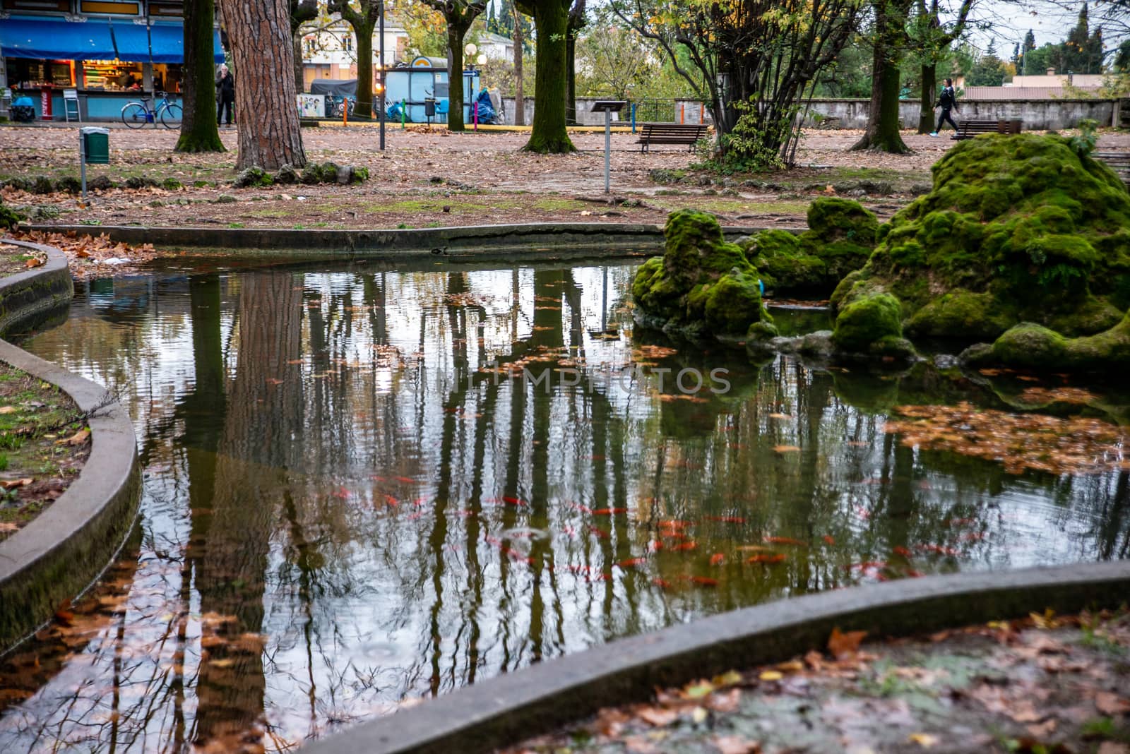 reflections on the fountain of the promenade in terni