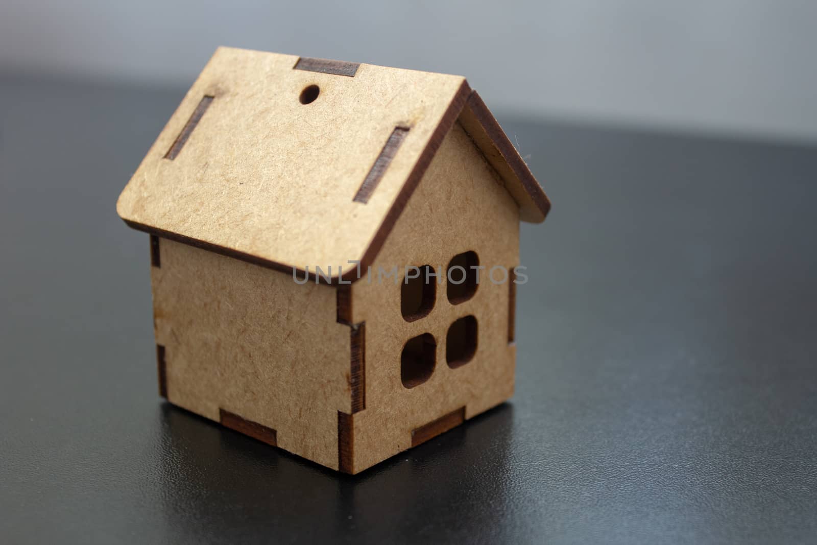 Small house made of wood on laser cut used for decoration