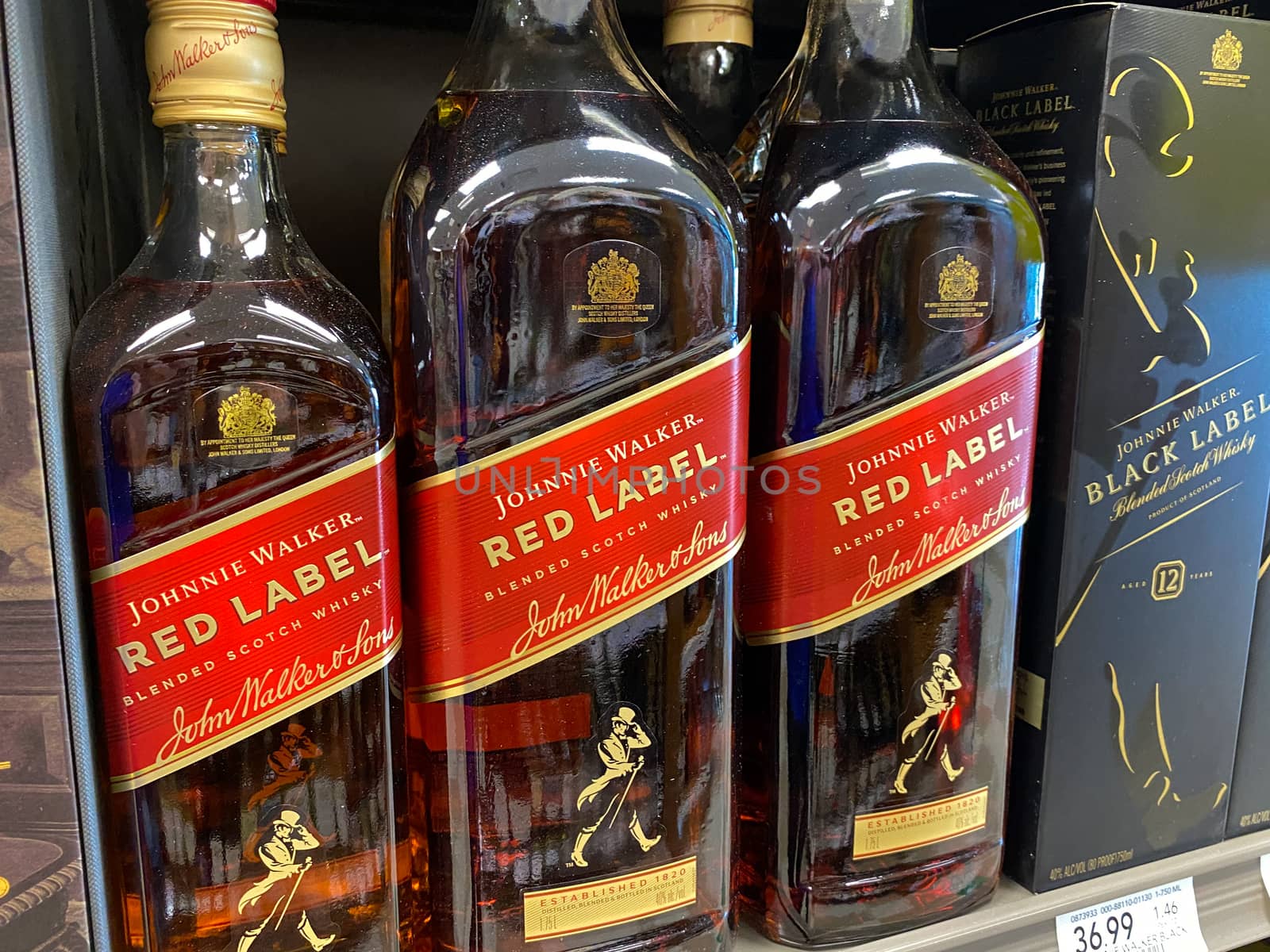 Orlando,FL/USA -5/13/20: A display of Johnnie Walkder Red Label Blended Scotch Whisky at a Publix liqour store.