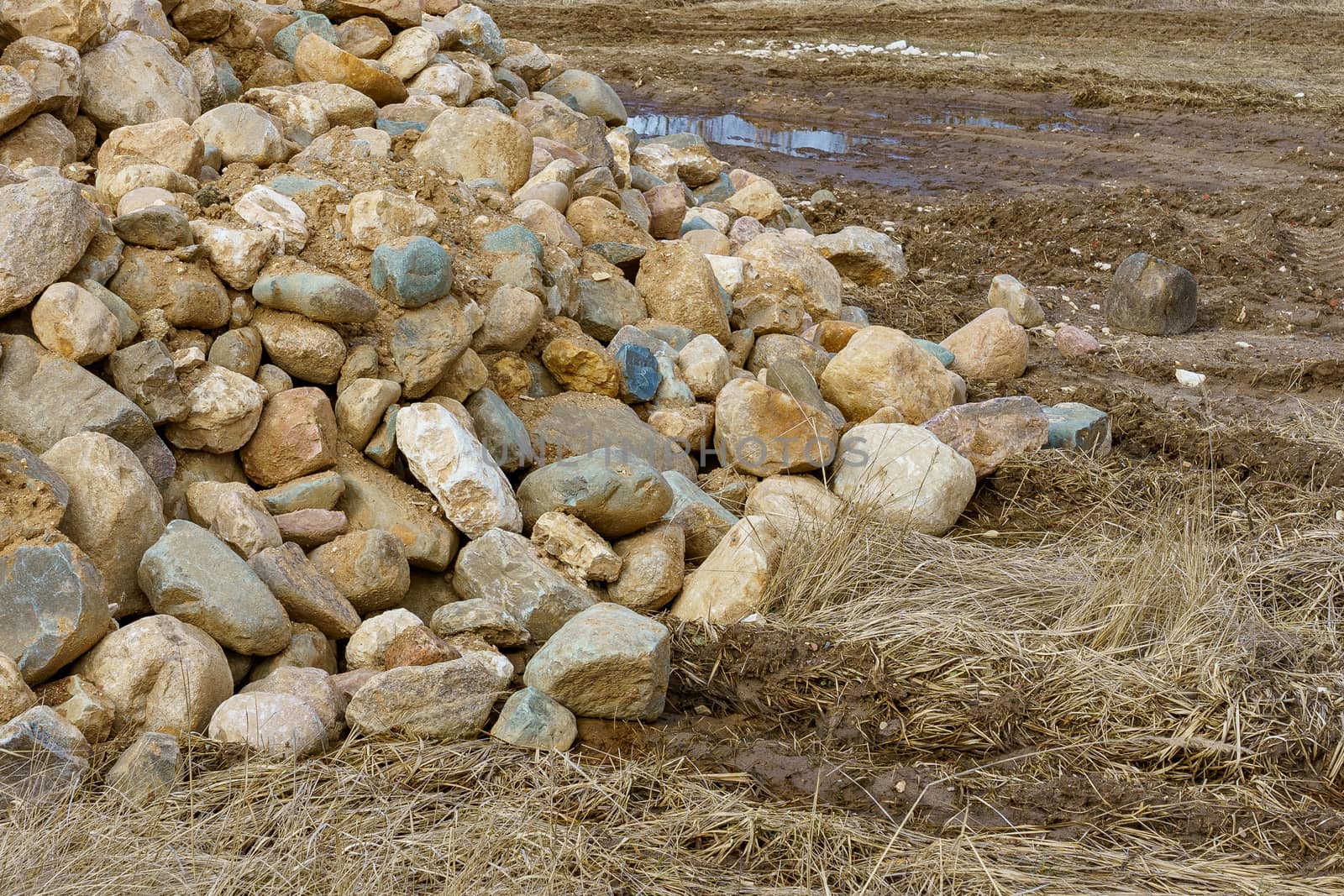 pile of cobblestones with sand prepared for construction