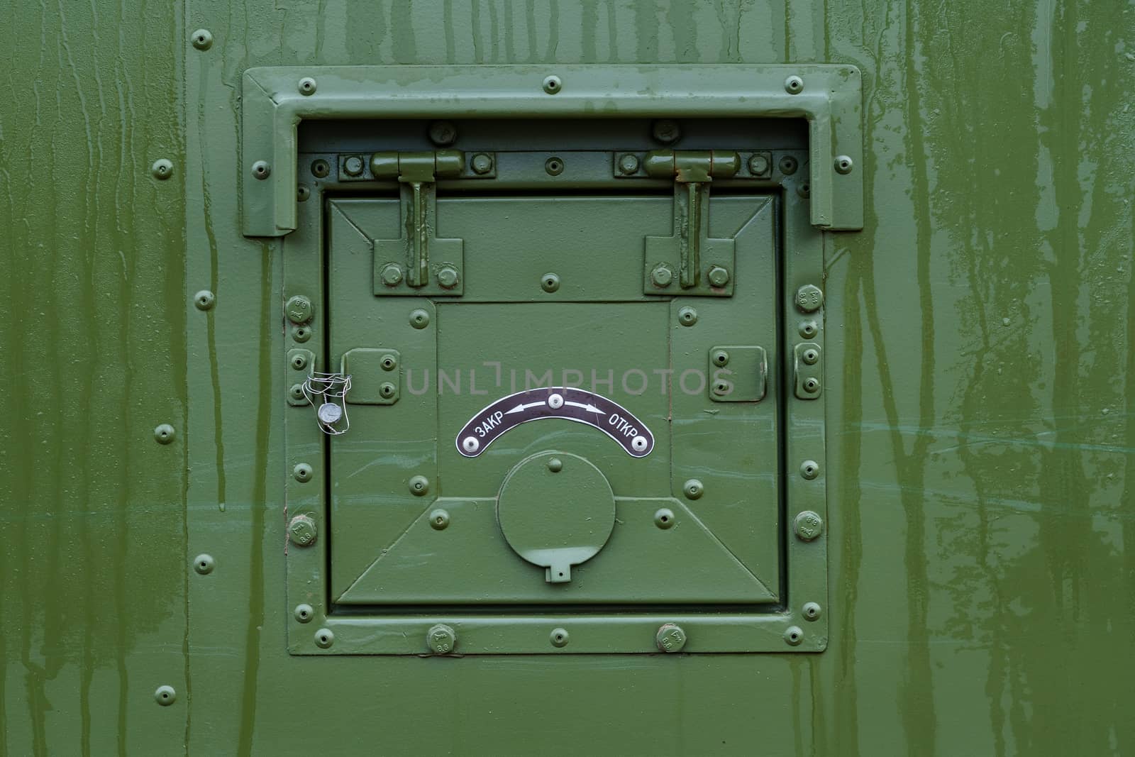 dark green cover on board a military vehicle by VADIM