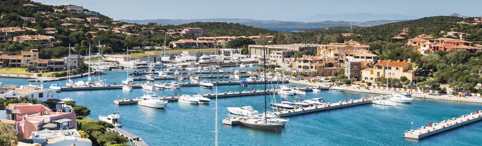 Boats in the harbor of porto servo, the exclusive village on sardinia where in the summer the rich and famous have their vacations