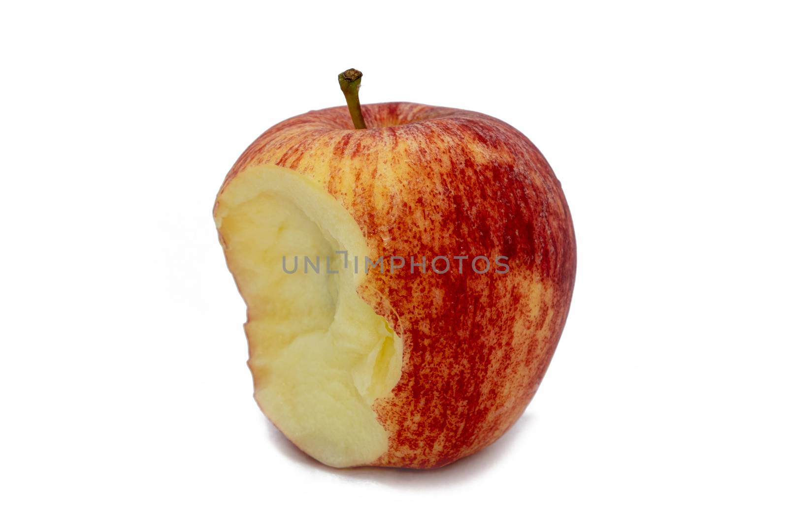 A Red apple with missing a bite isolated on white background