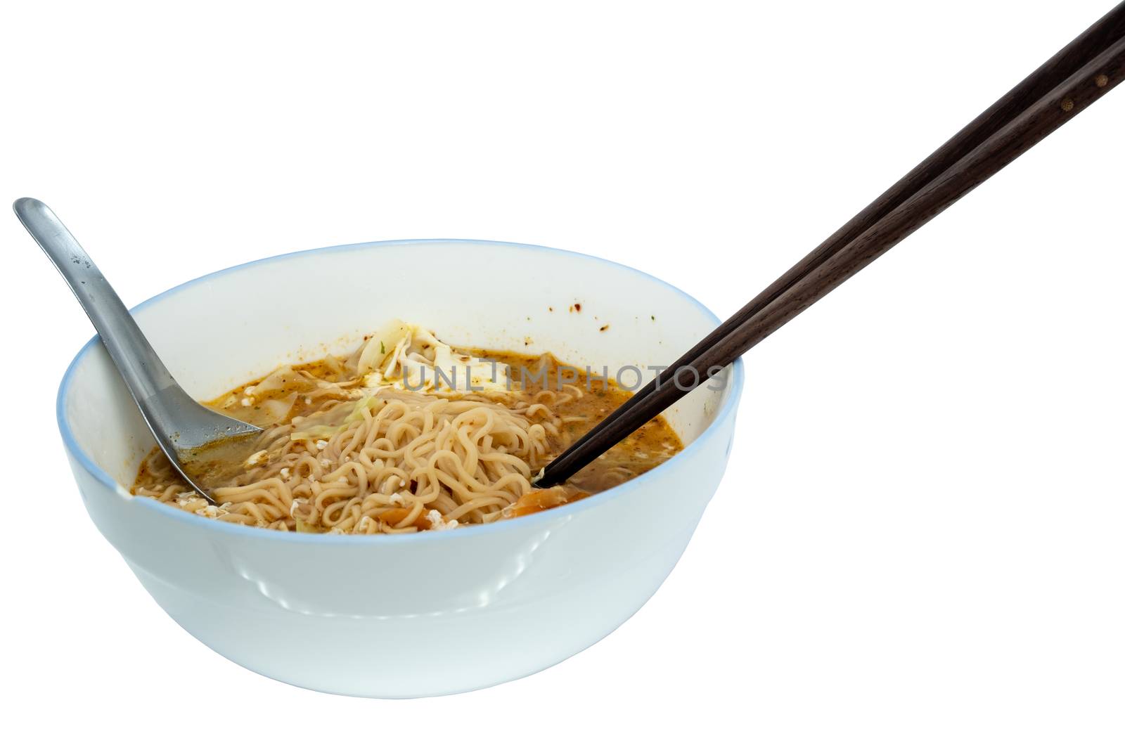 The Instant noodle with spoon and chopsticks in a white ceramic bowl isolated on white.
